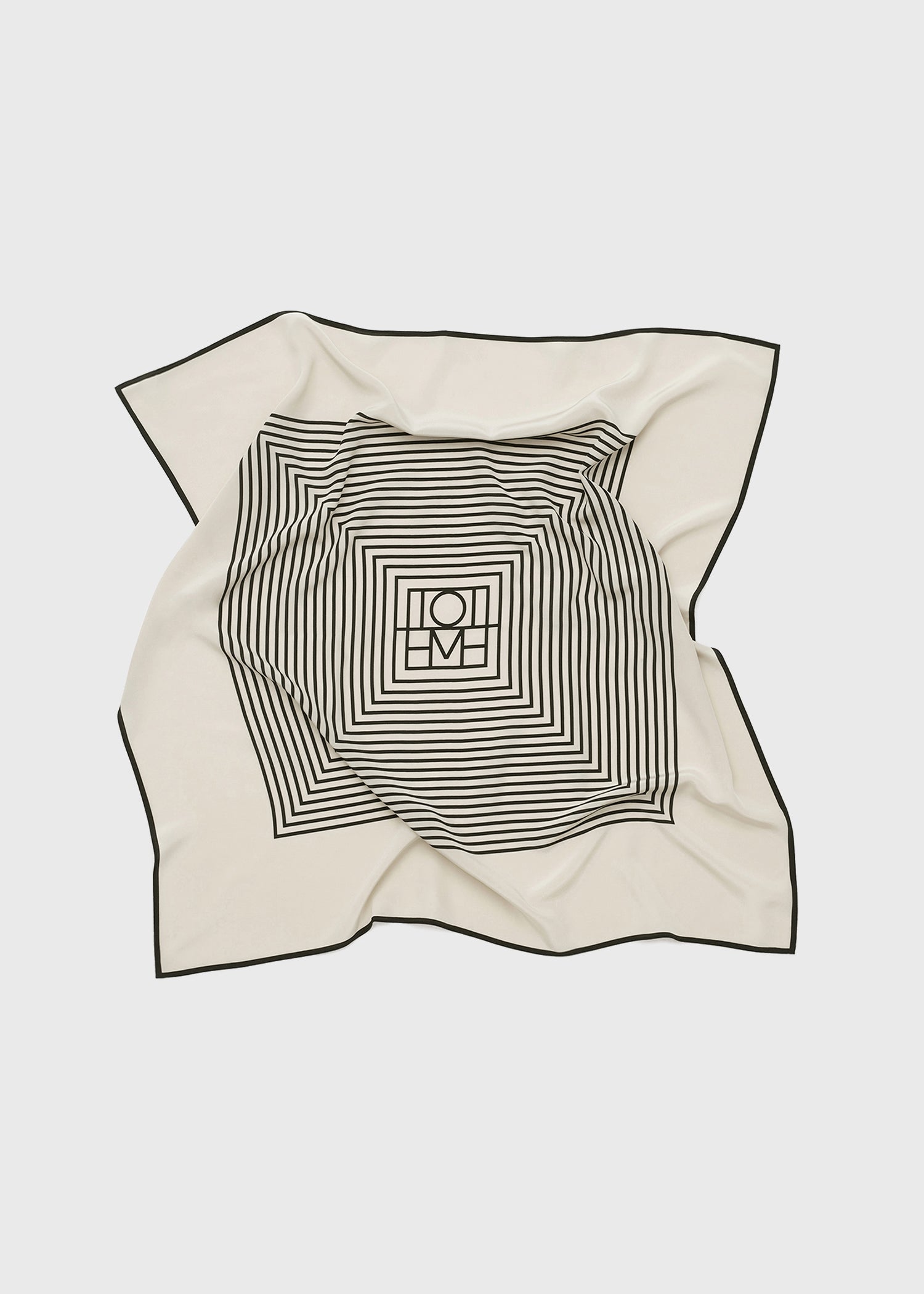 Centered monogram silk scarf crème