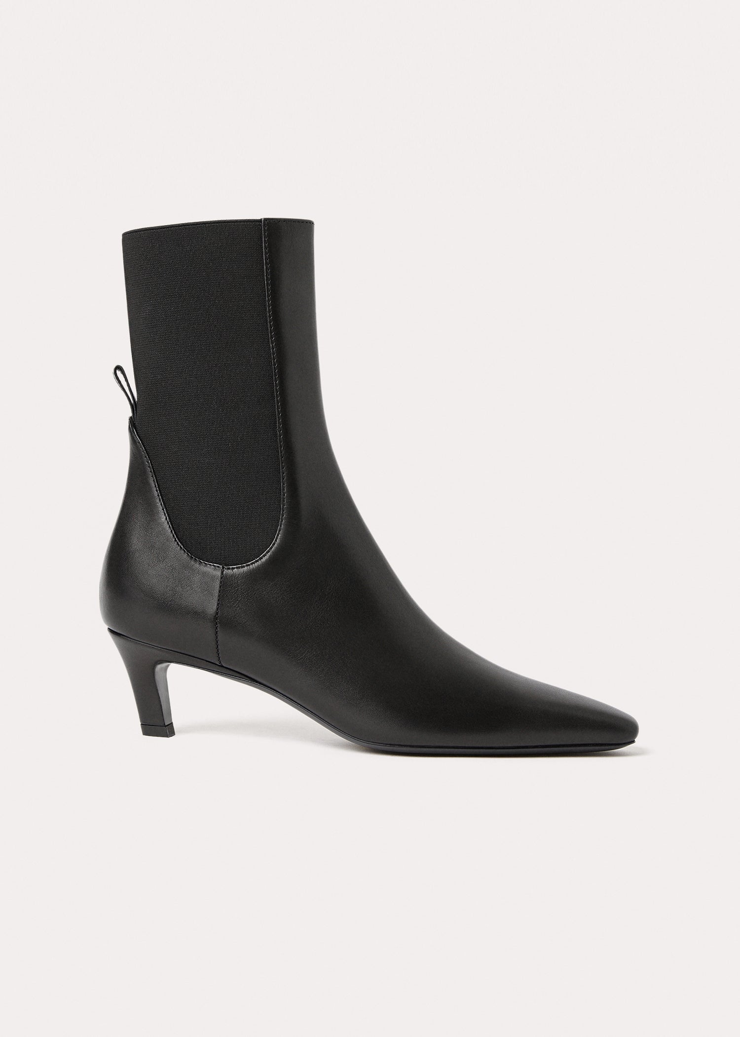 Sleek Knee-Length Dress and Heel Boots