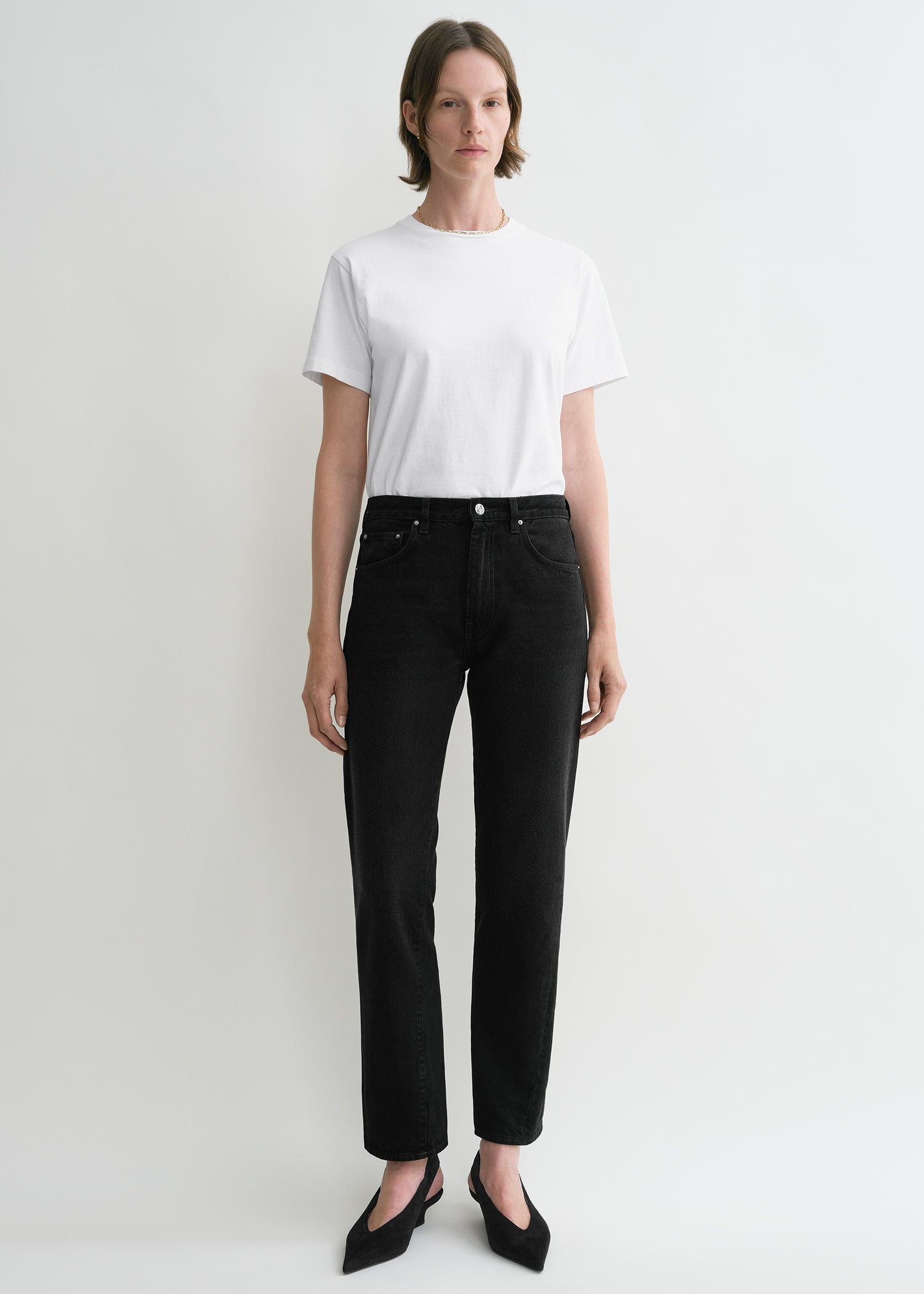 Twisted seam denim faded black from Toteme - $180