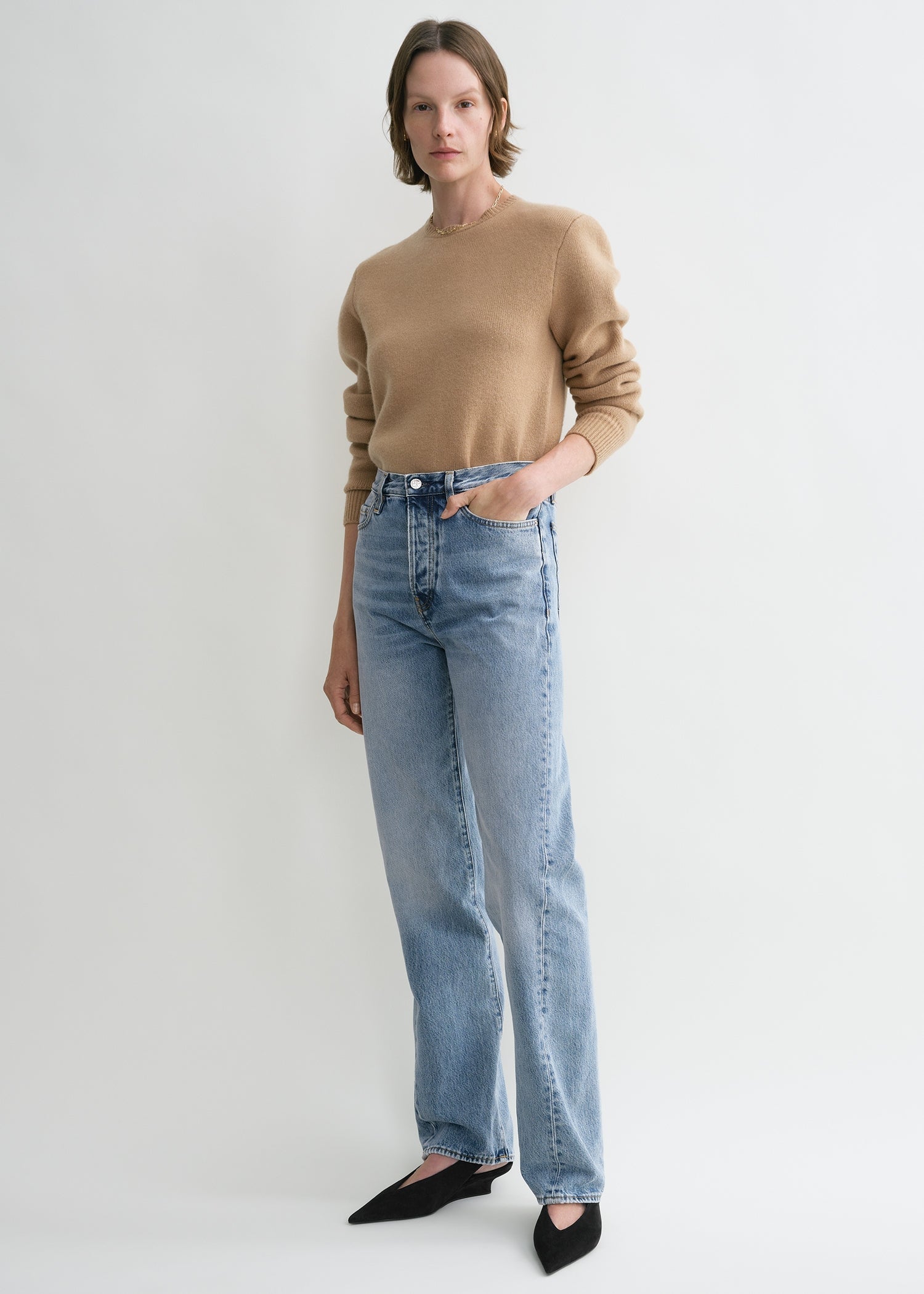 Twisted seam denim full length worn blue