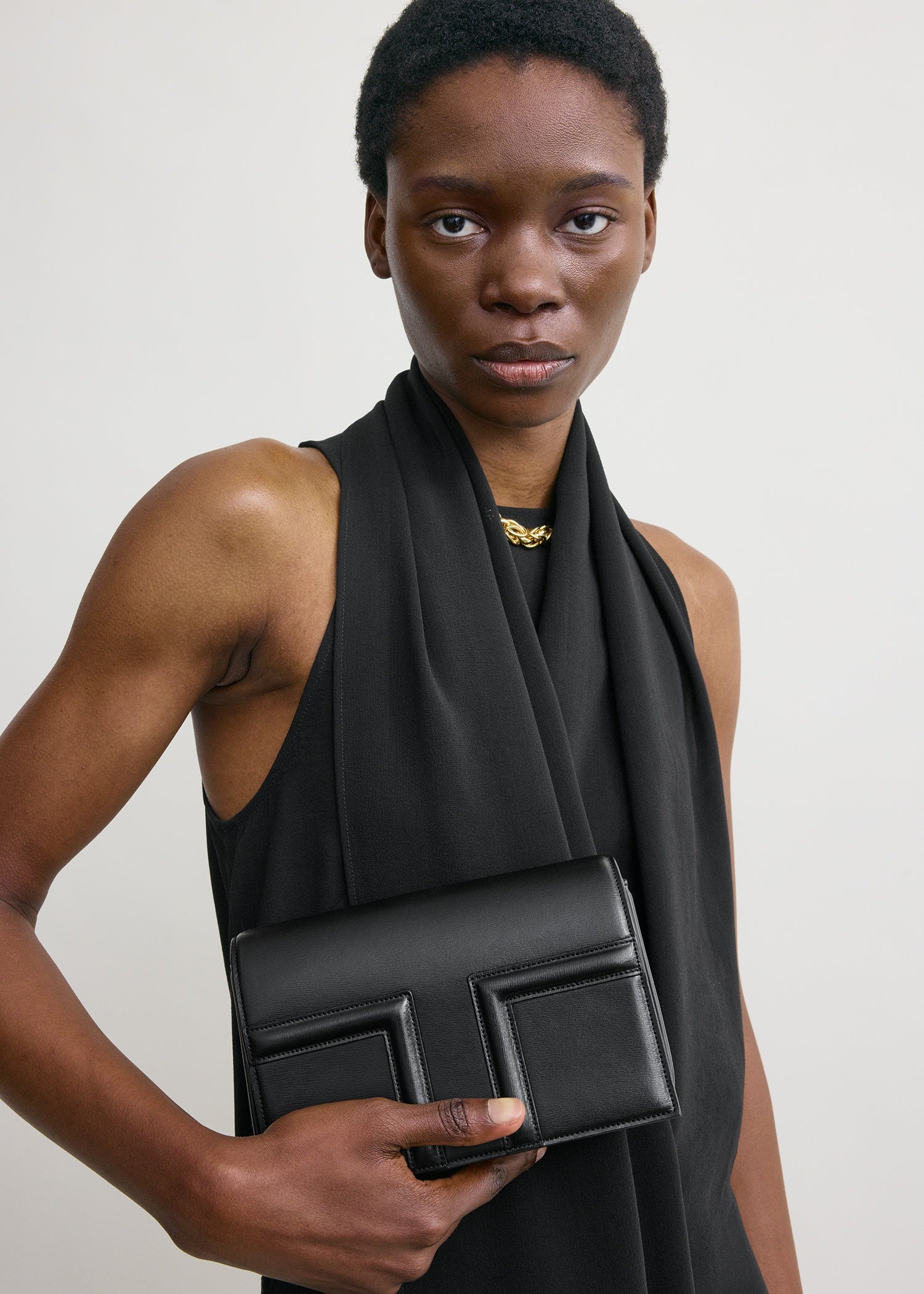 Mini T-flap leather bag black – TOTEME