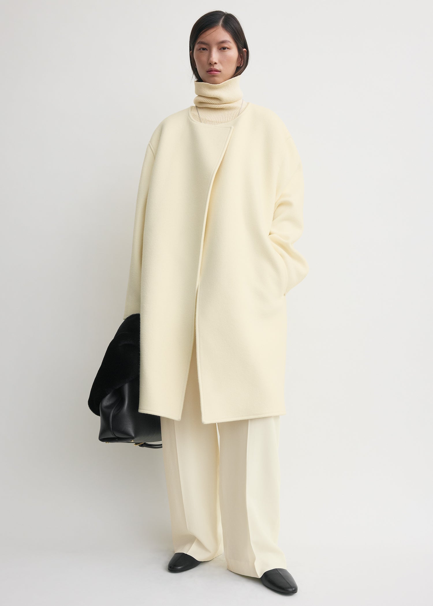 Collarless felt coat ecru from Toteme - $820
