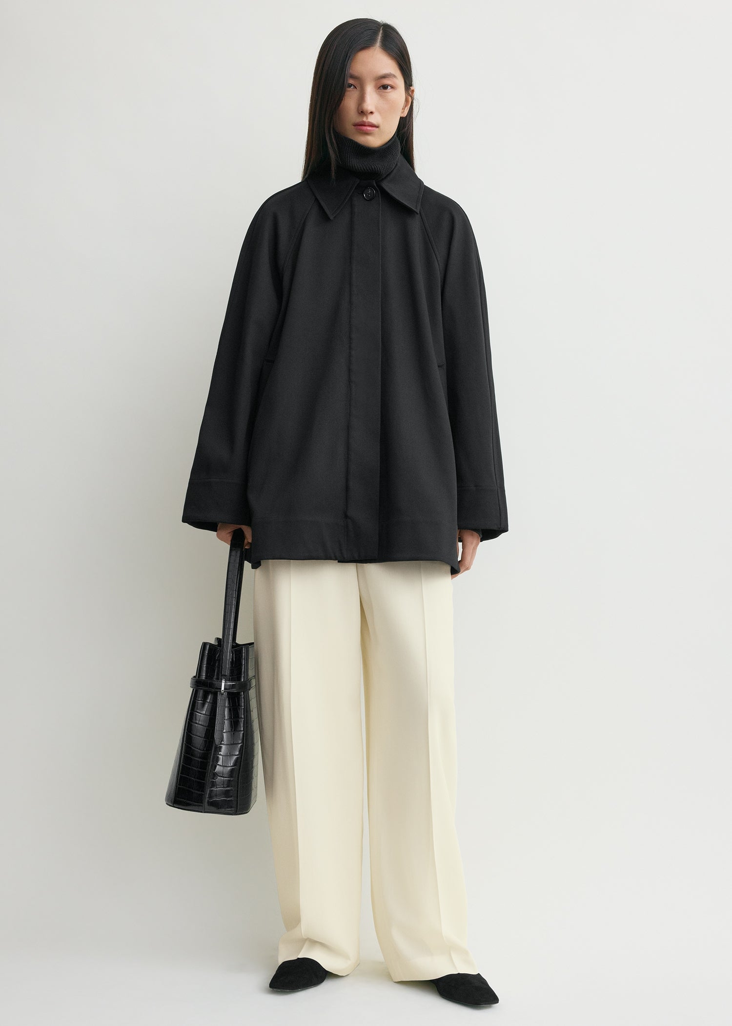 A-line raglan jacket black from Toteme - $356