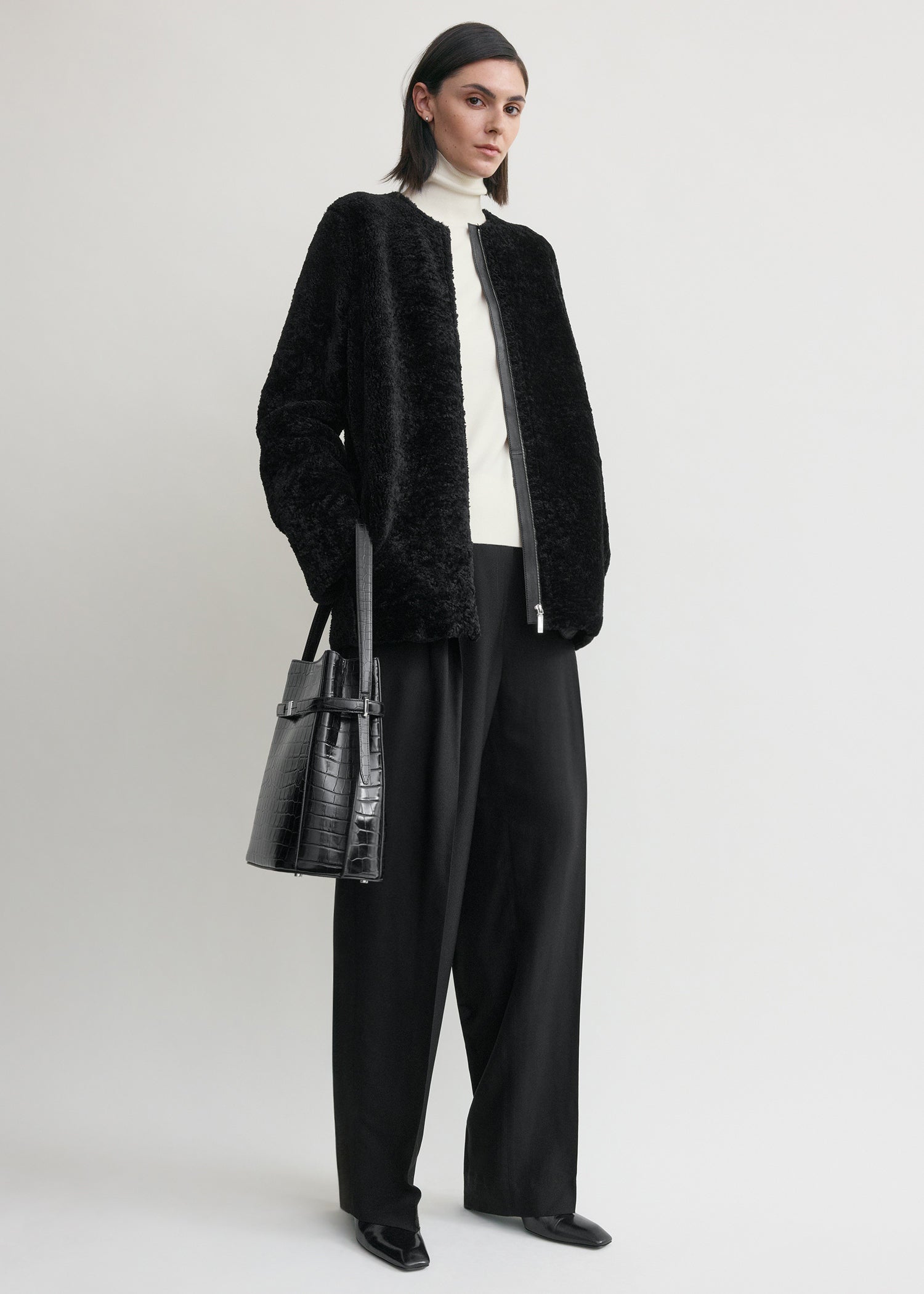 Zipped teddy shearling jacket black from Toteme - $3,200