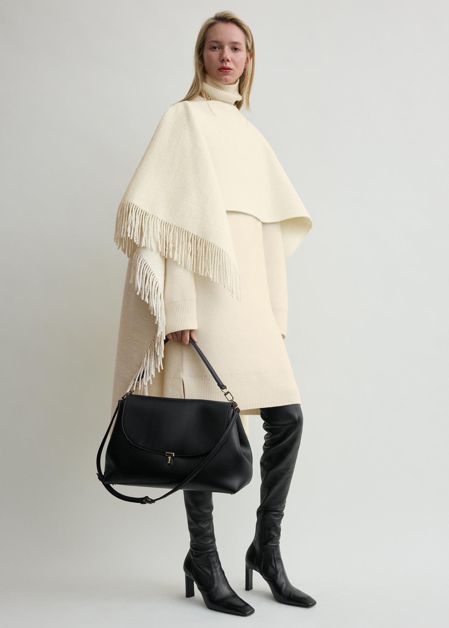 Fringed poncho winter white from Toteme - $370