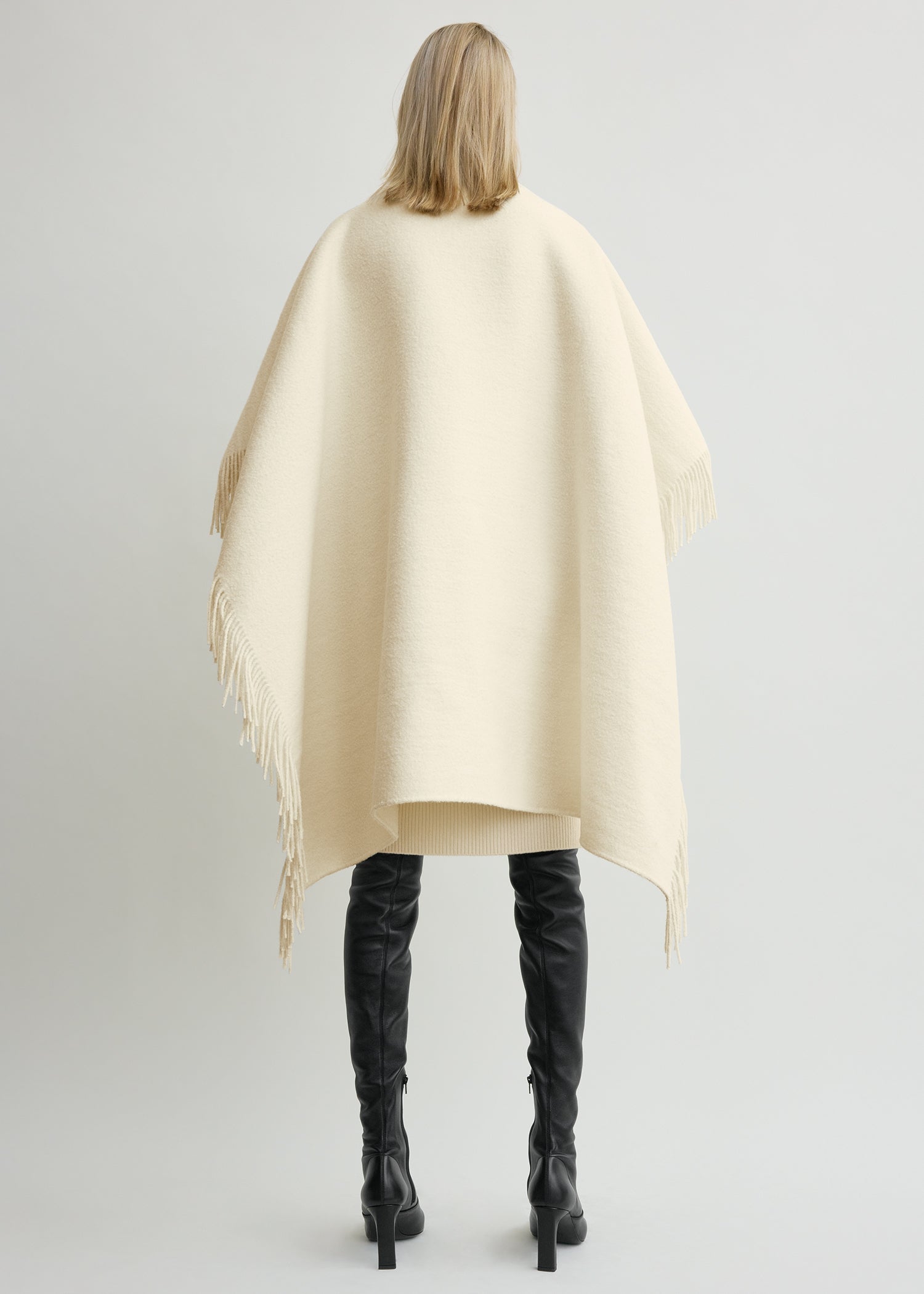 Fringed poncho winter white