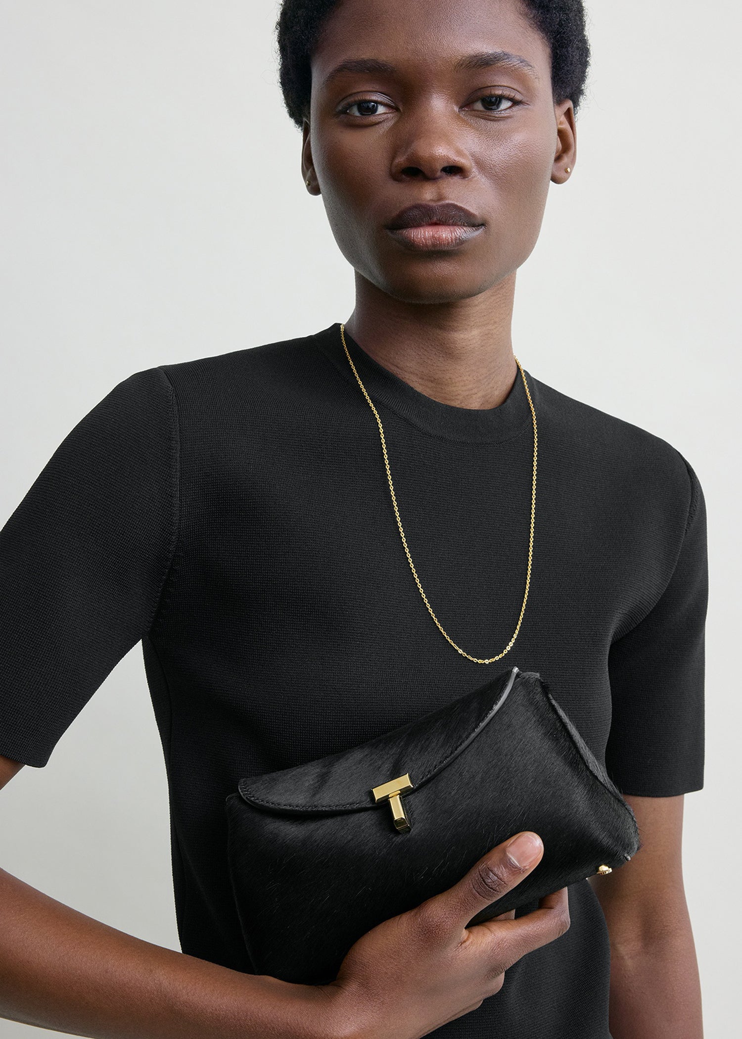 Mini T-lock pony hair clutch black