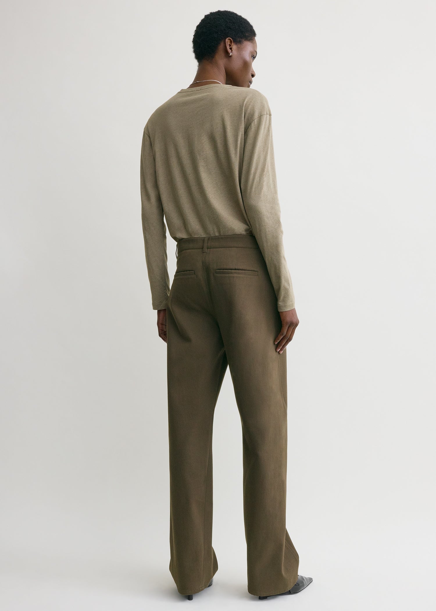Relaxed twisted trousers pepper