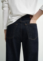 Twisted seam denim full length rinsed blue