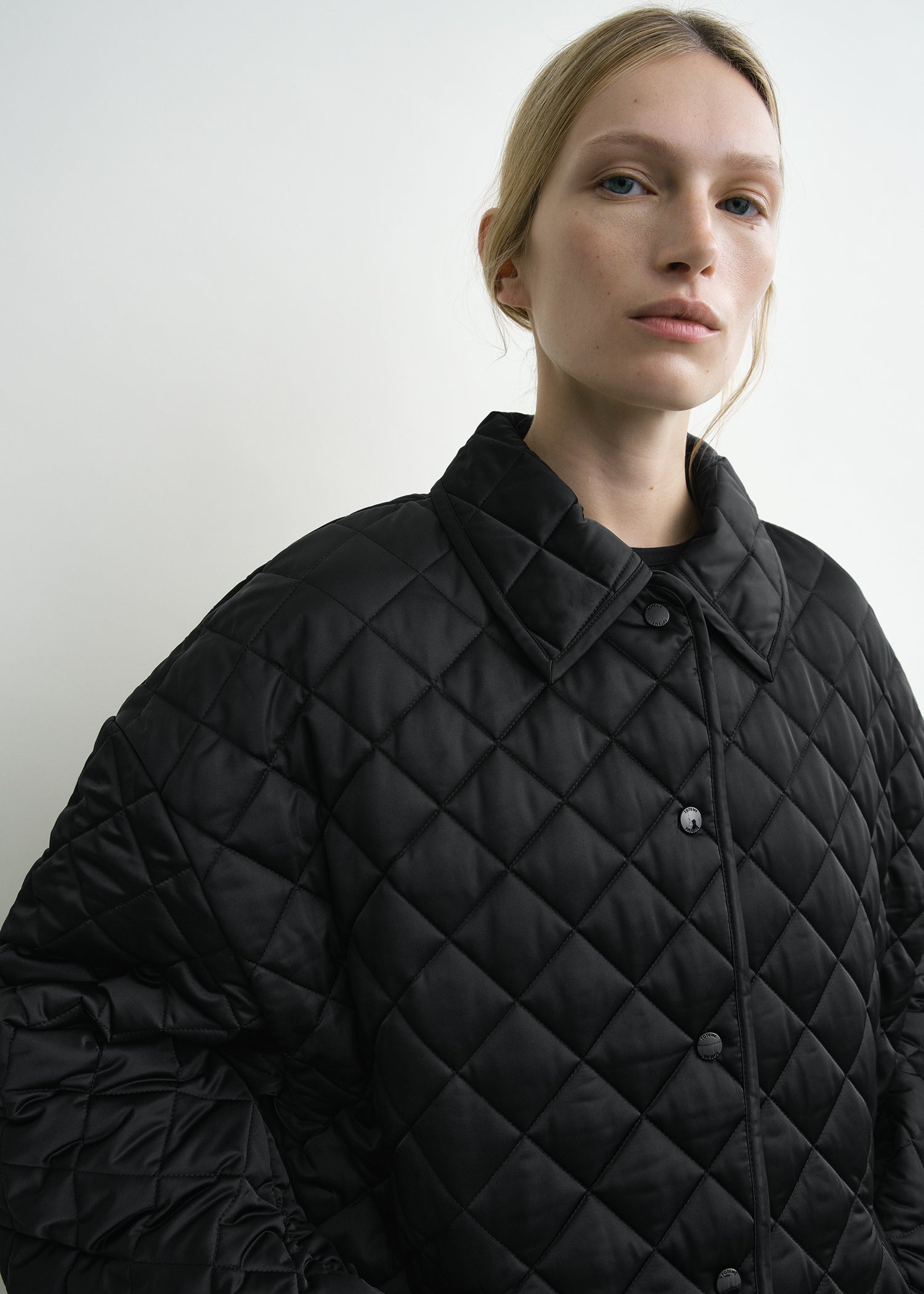 Collared quilted jacket black