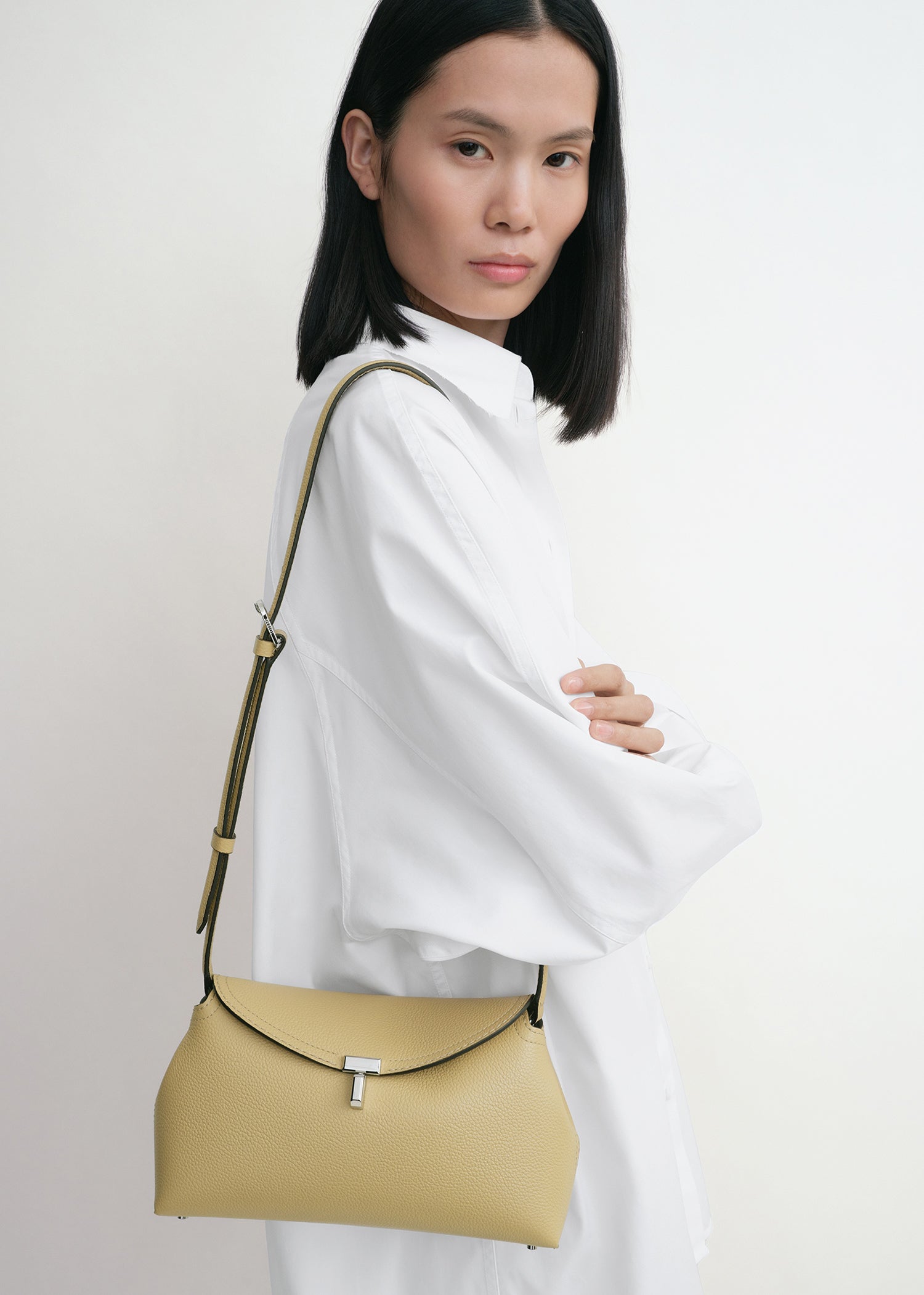 T-lock grained-leather clutch desert