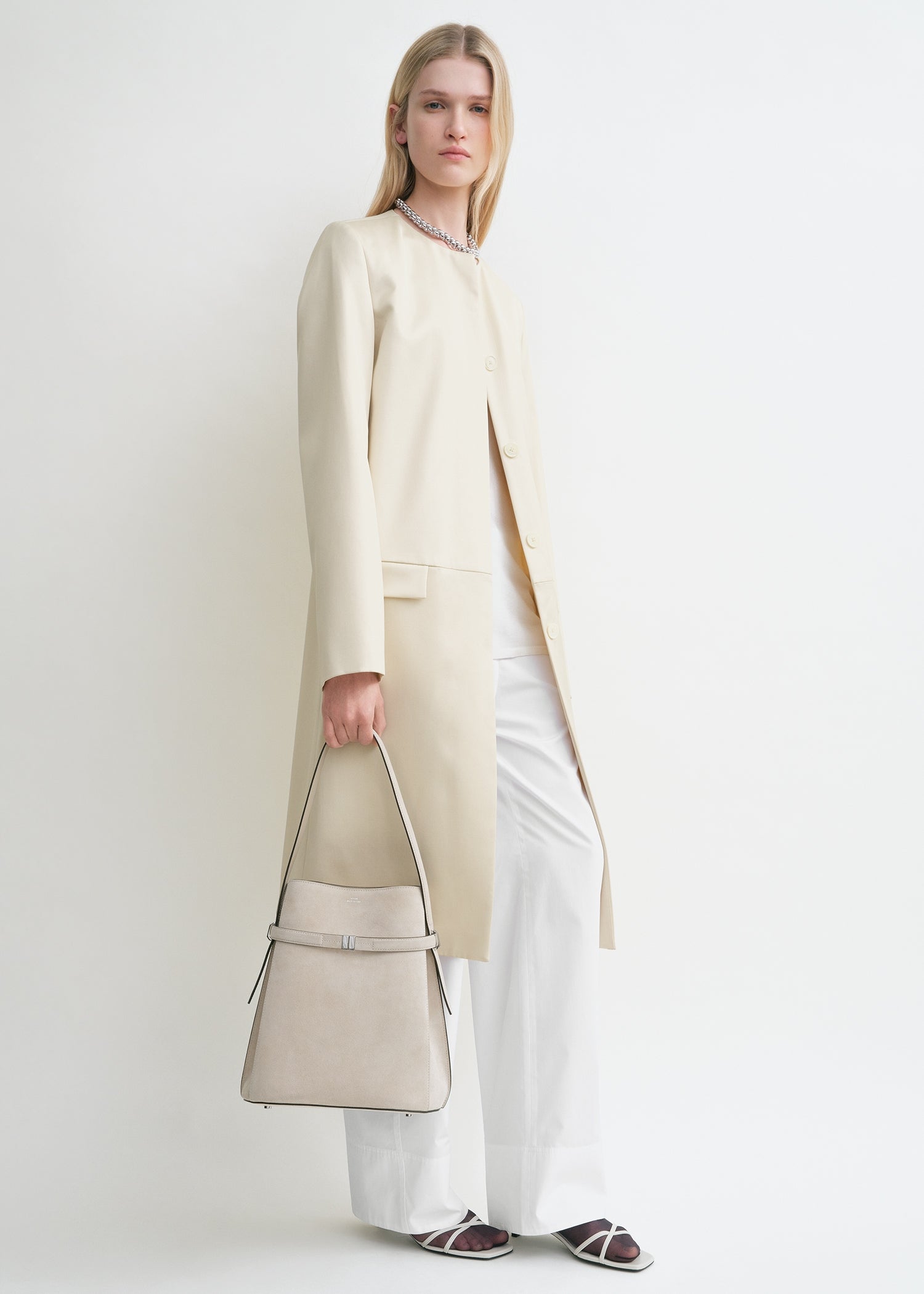 Belted suede bucket bag pearl