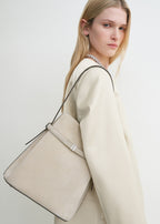 Belted suede bucket bag pearl