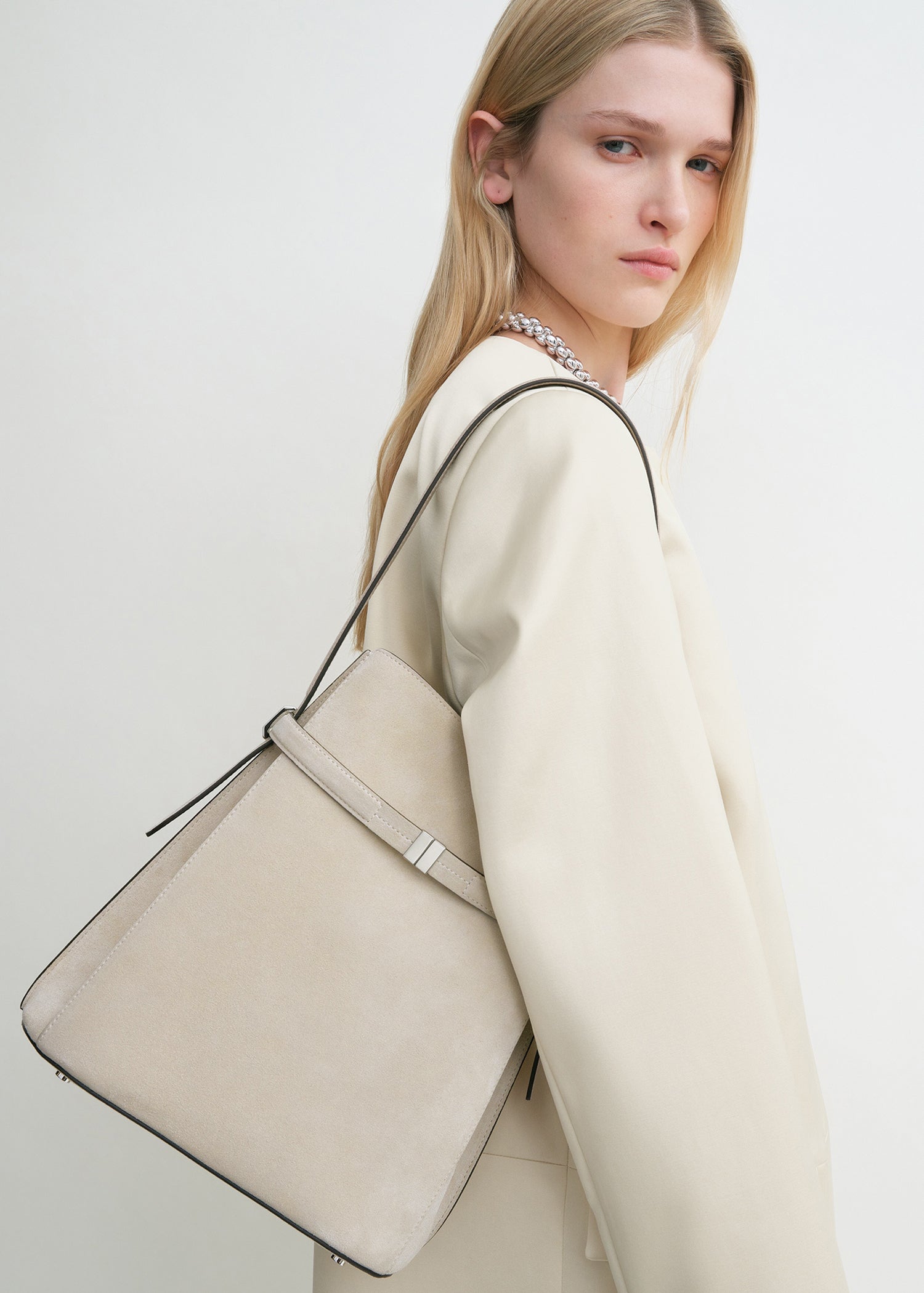 Belted suede bucket bag pearl