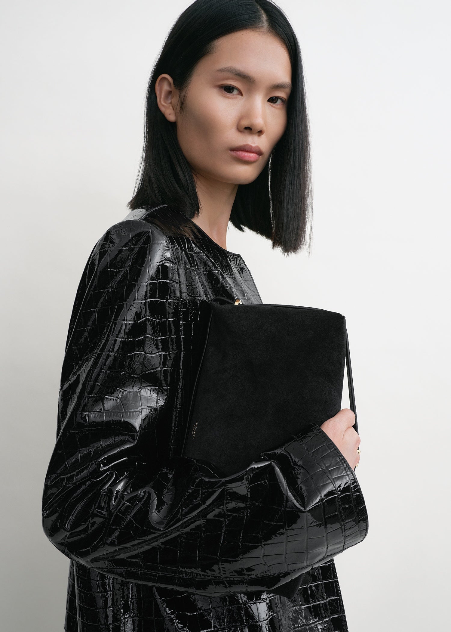 Belted suede clutch black