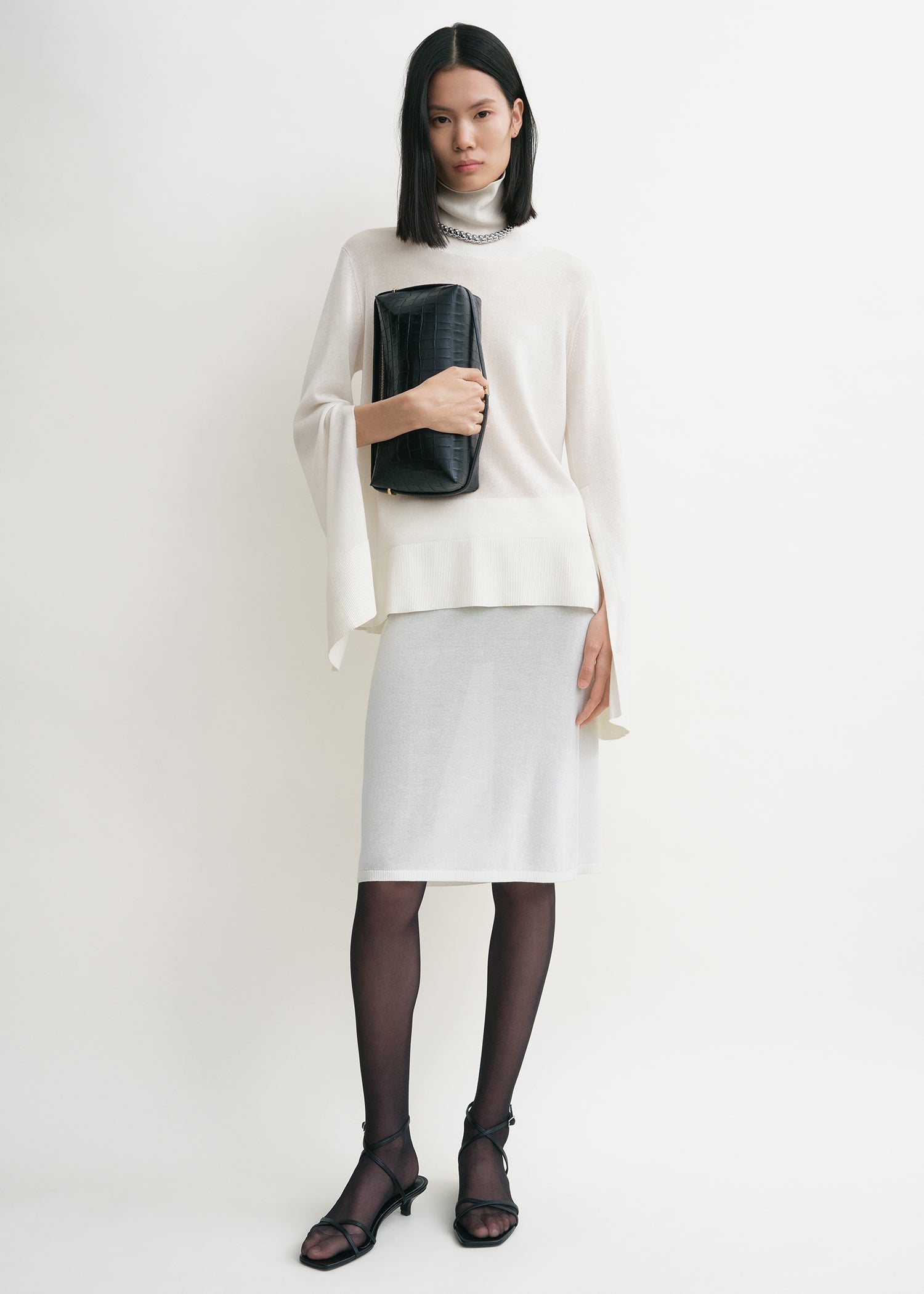 Slit sleeve turtleneck white – TOTEME