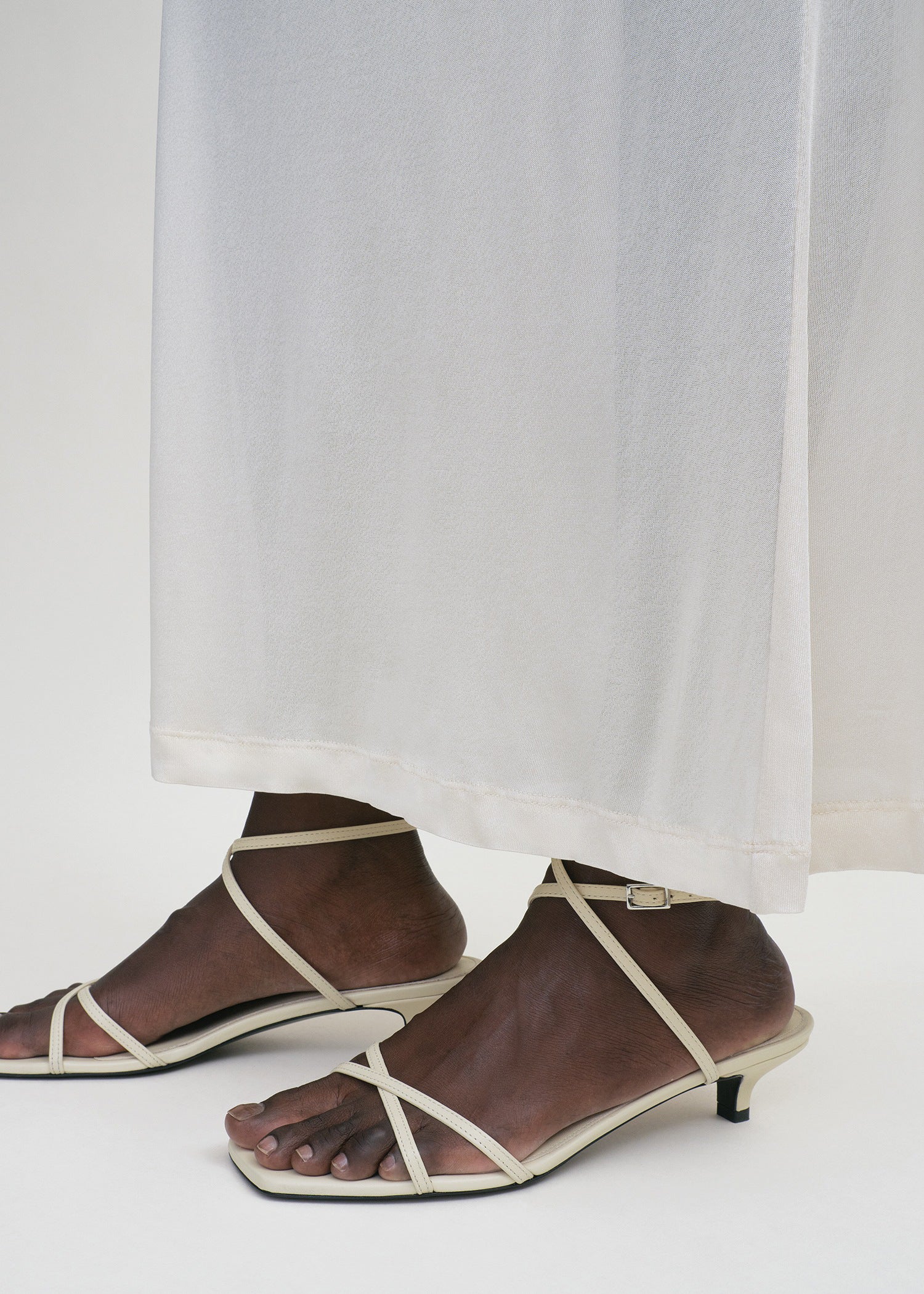 Leather crossover sandals off-white