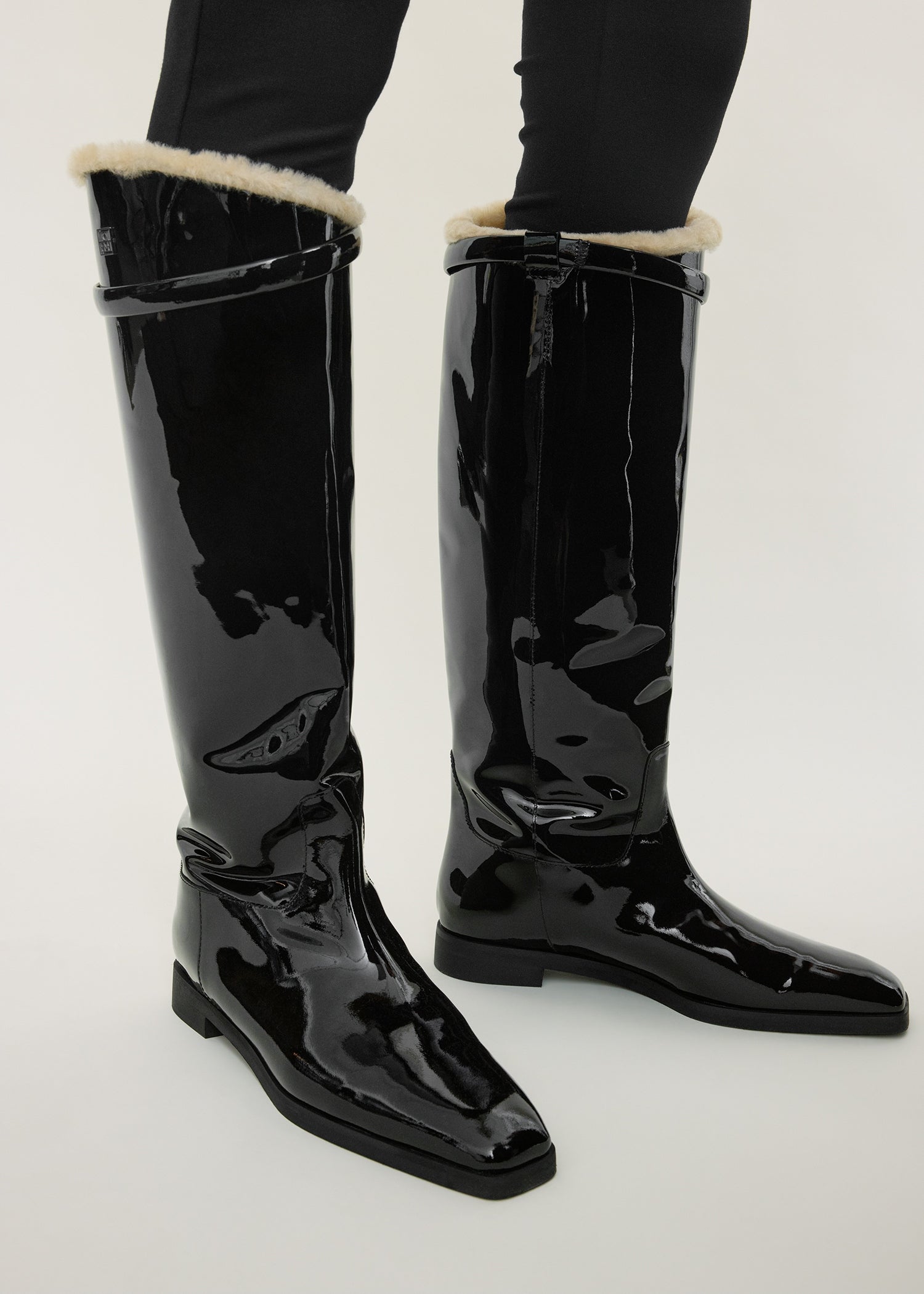 Shearling riding boots black/beige