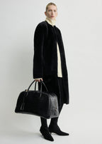 Croco-embossed traveler black