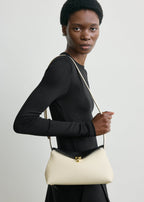 T-lock embroidered leather clutch black/milk