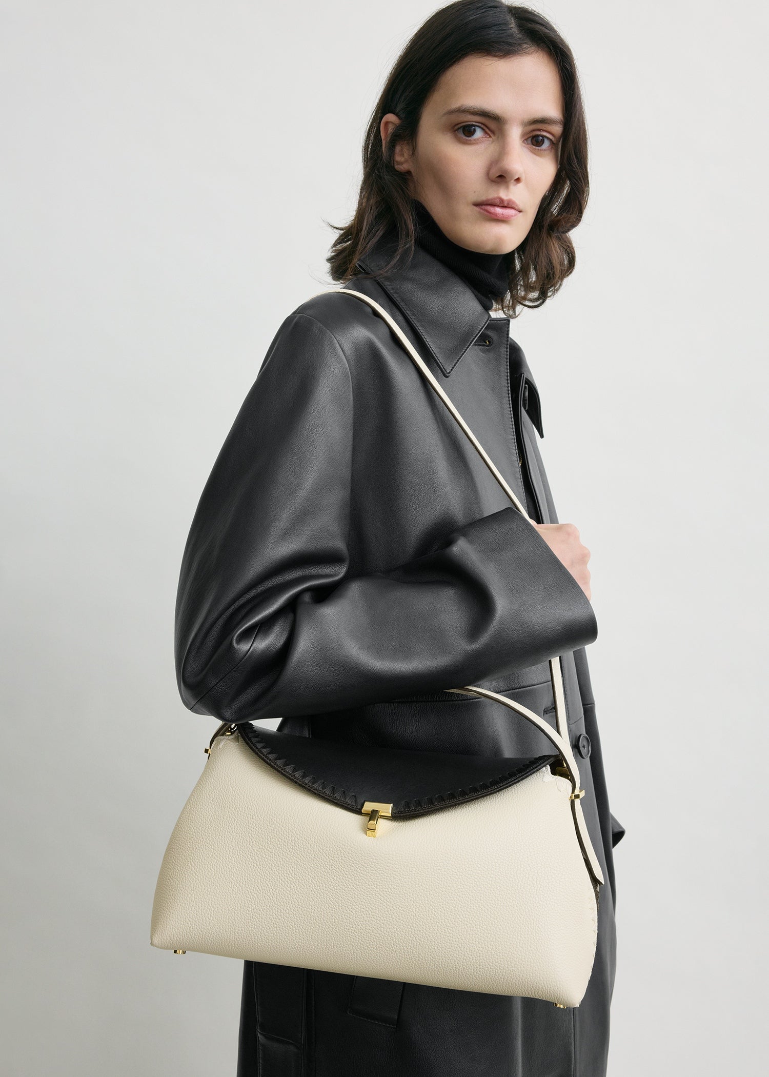 T-lock embroidered leather top handle black/milk