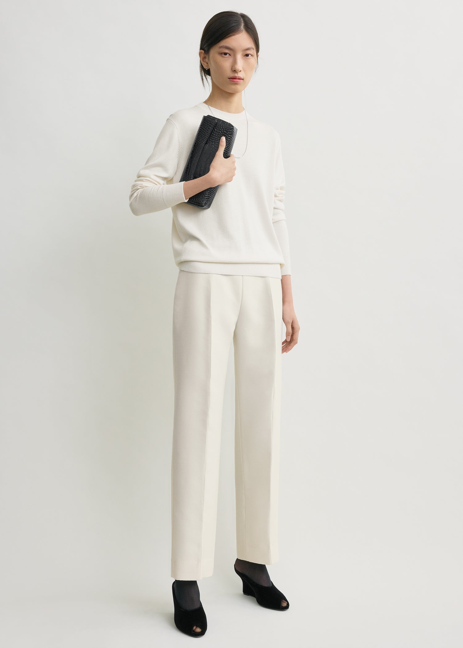 Slim evening trousers ecru from Toteme - $468