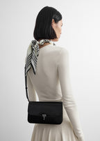 T-lock grained-patent crossbody black