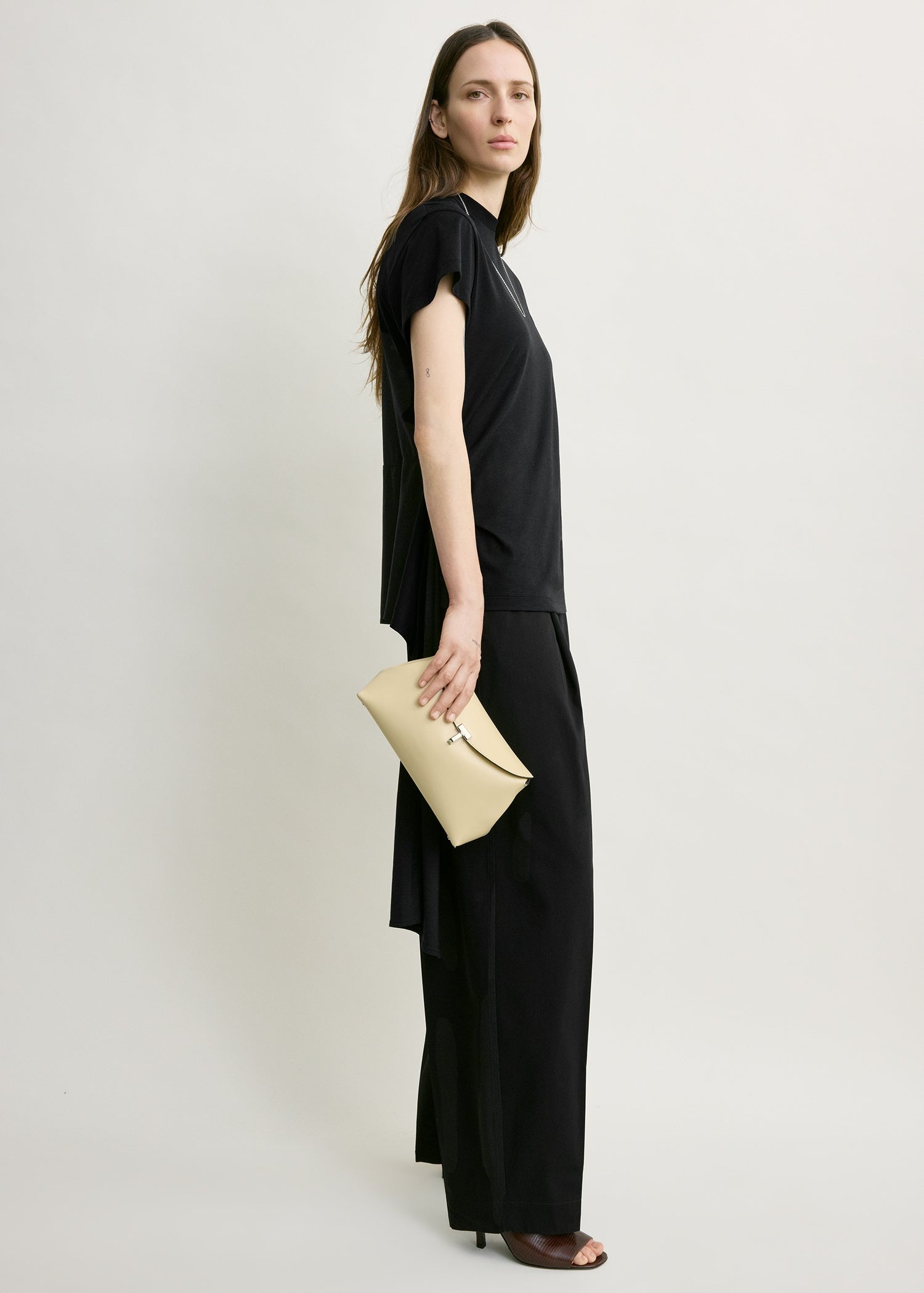 T-lock leather clutch champagne