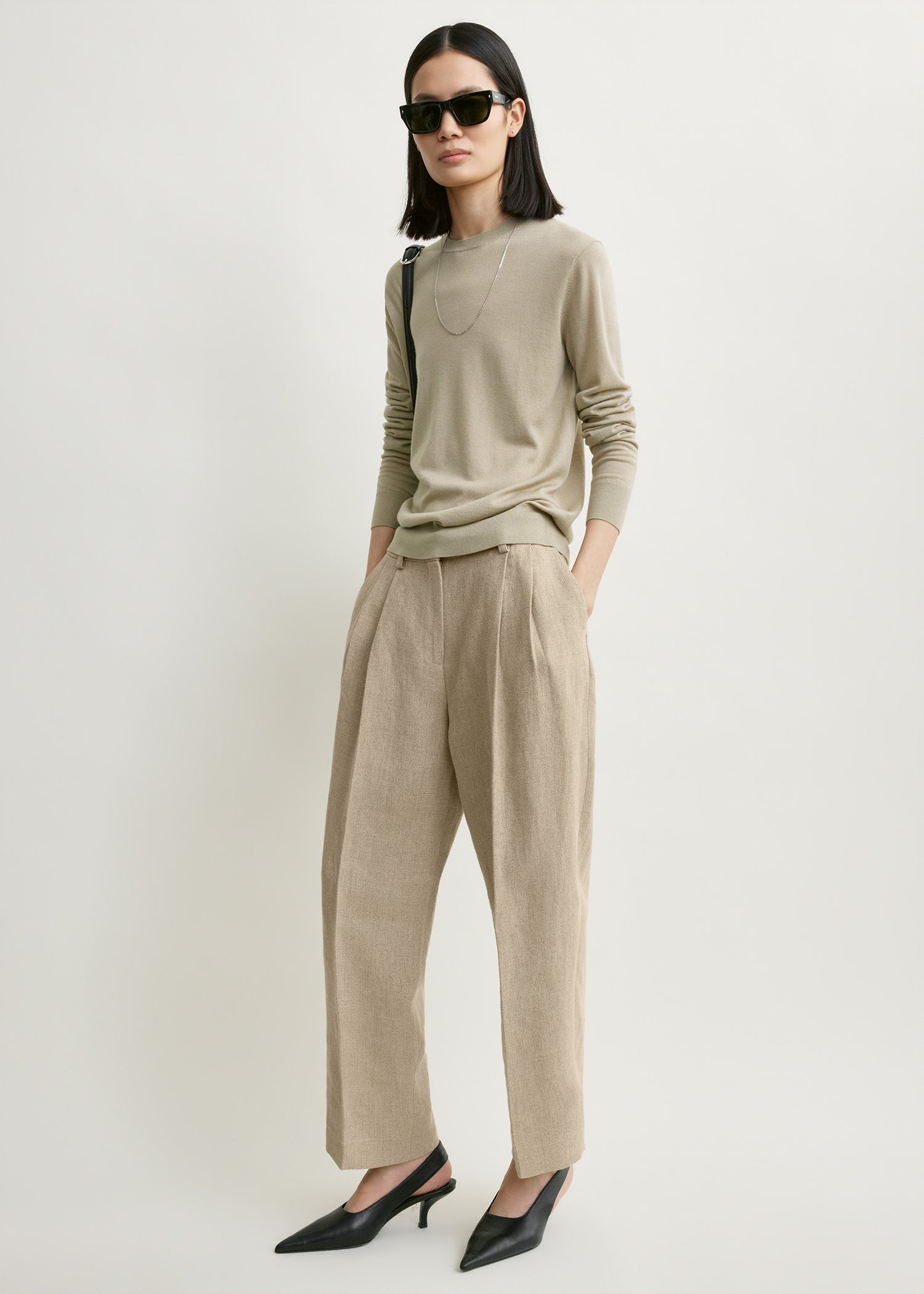 Double-pleat cropped linen trousers beige
