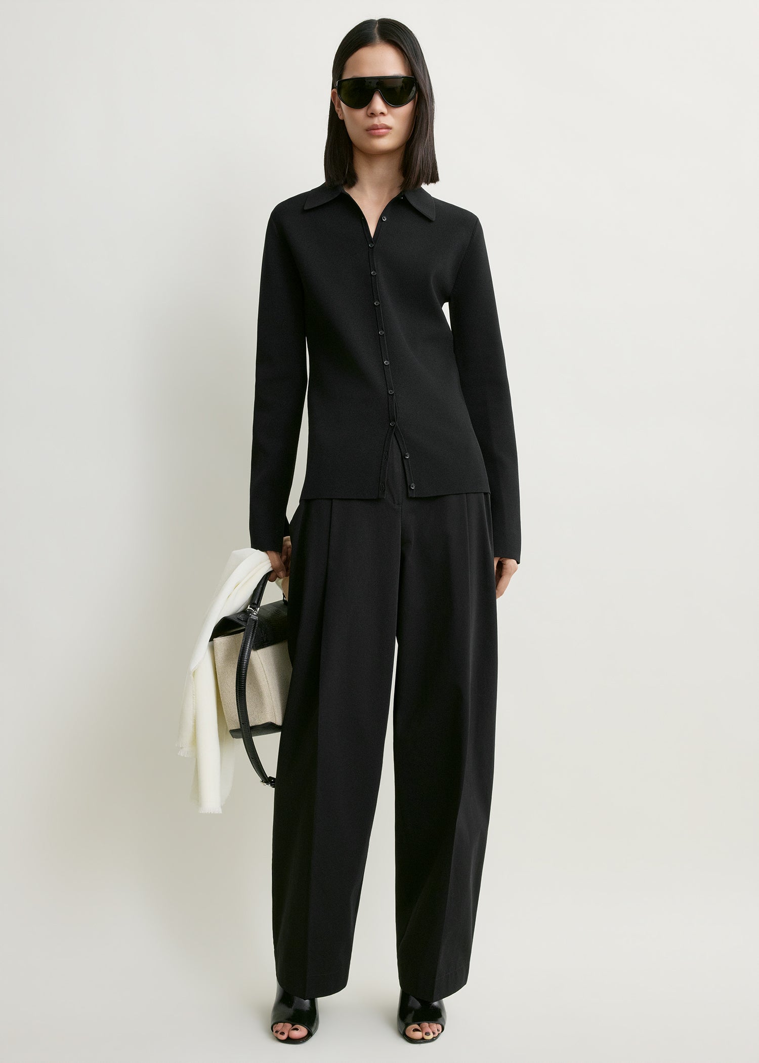 Compact knit buttoned top black