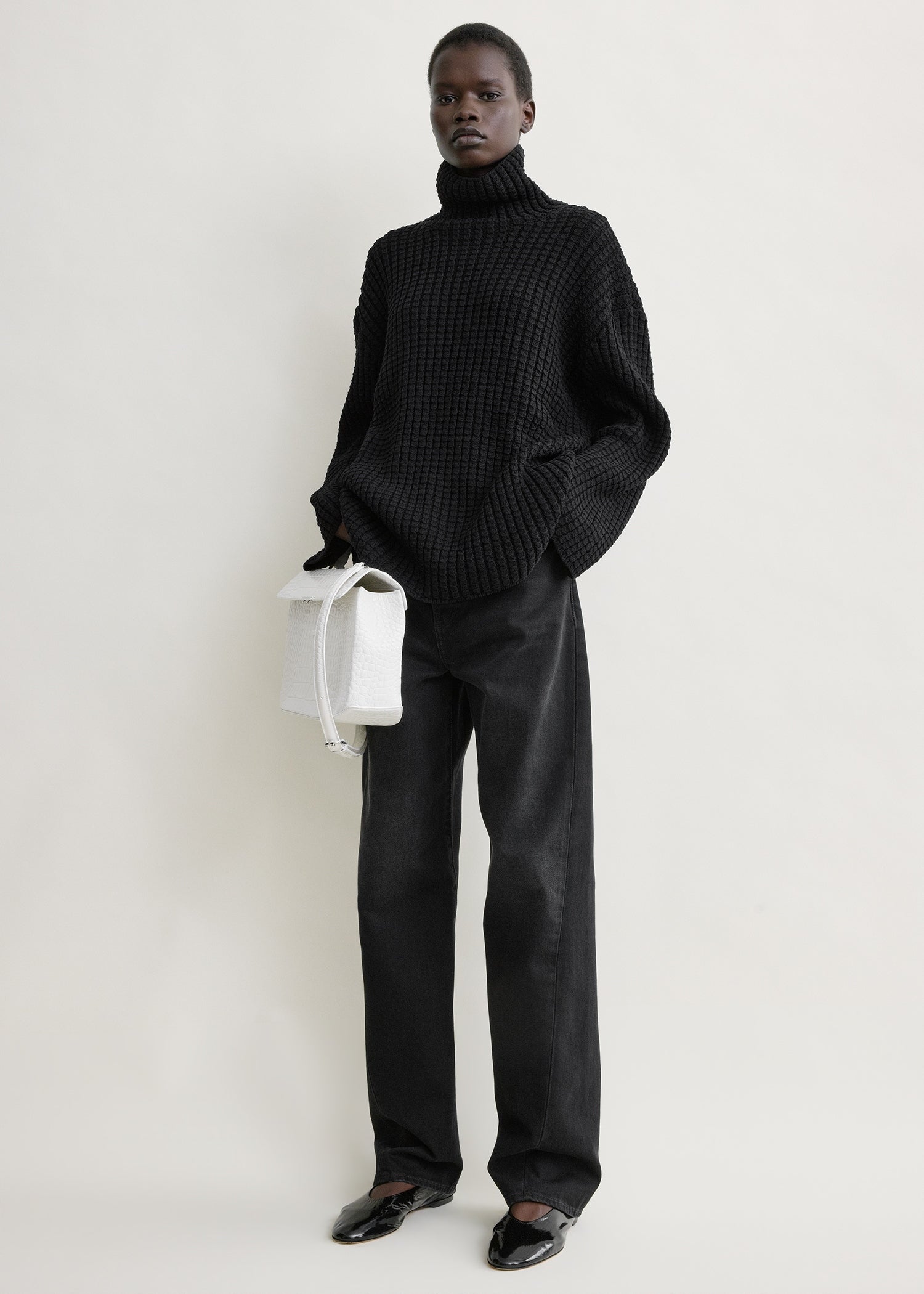 Whipstitch knit black from Toteme - $880