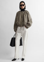 Gathered parachute coat rock