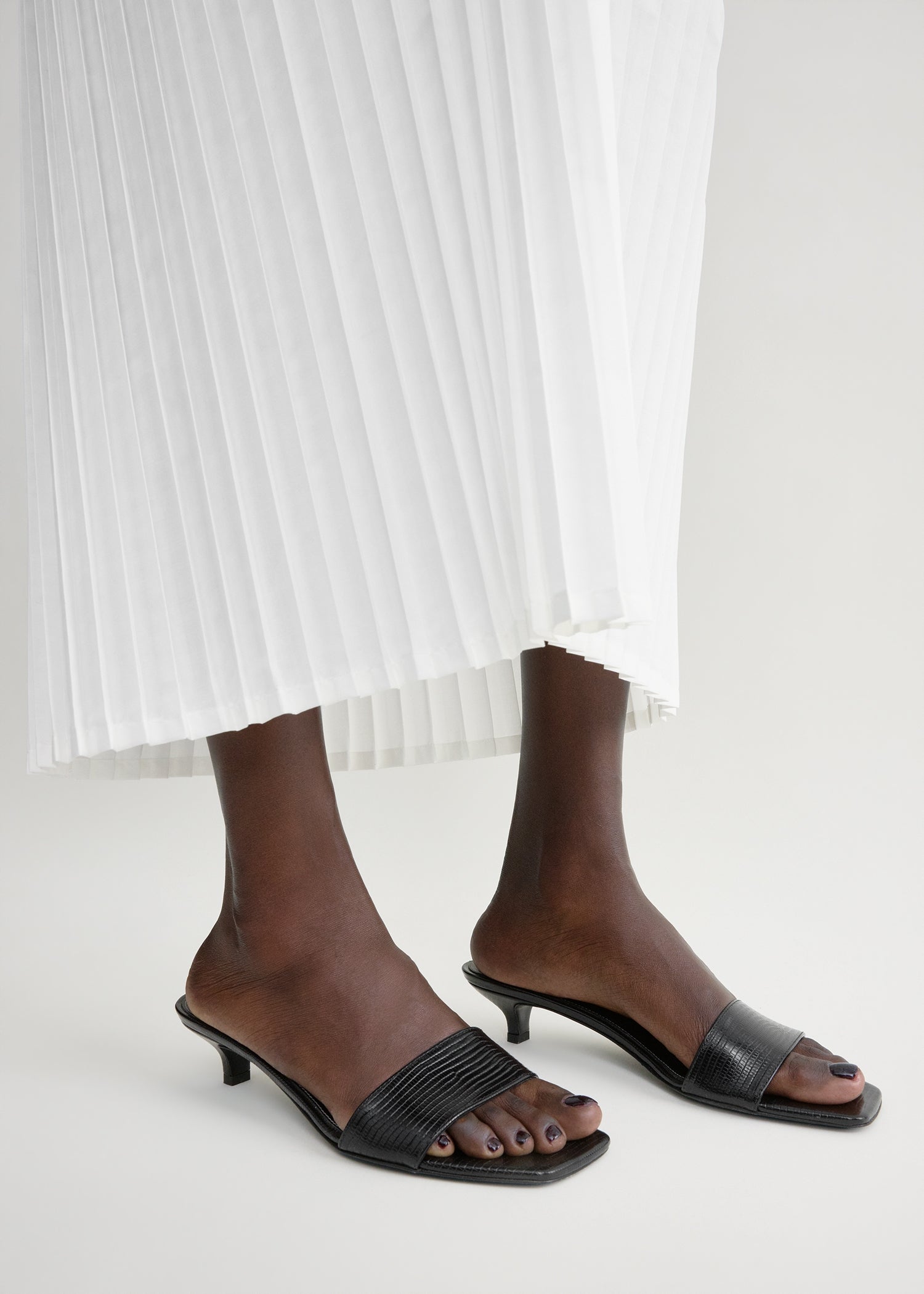 Slim lizard-embossed bandeau mules black