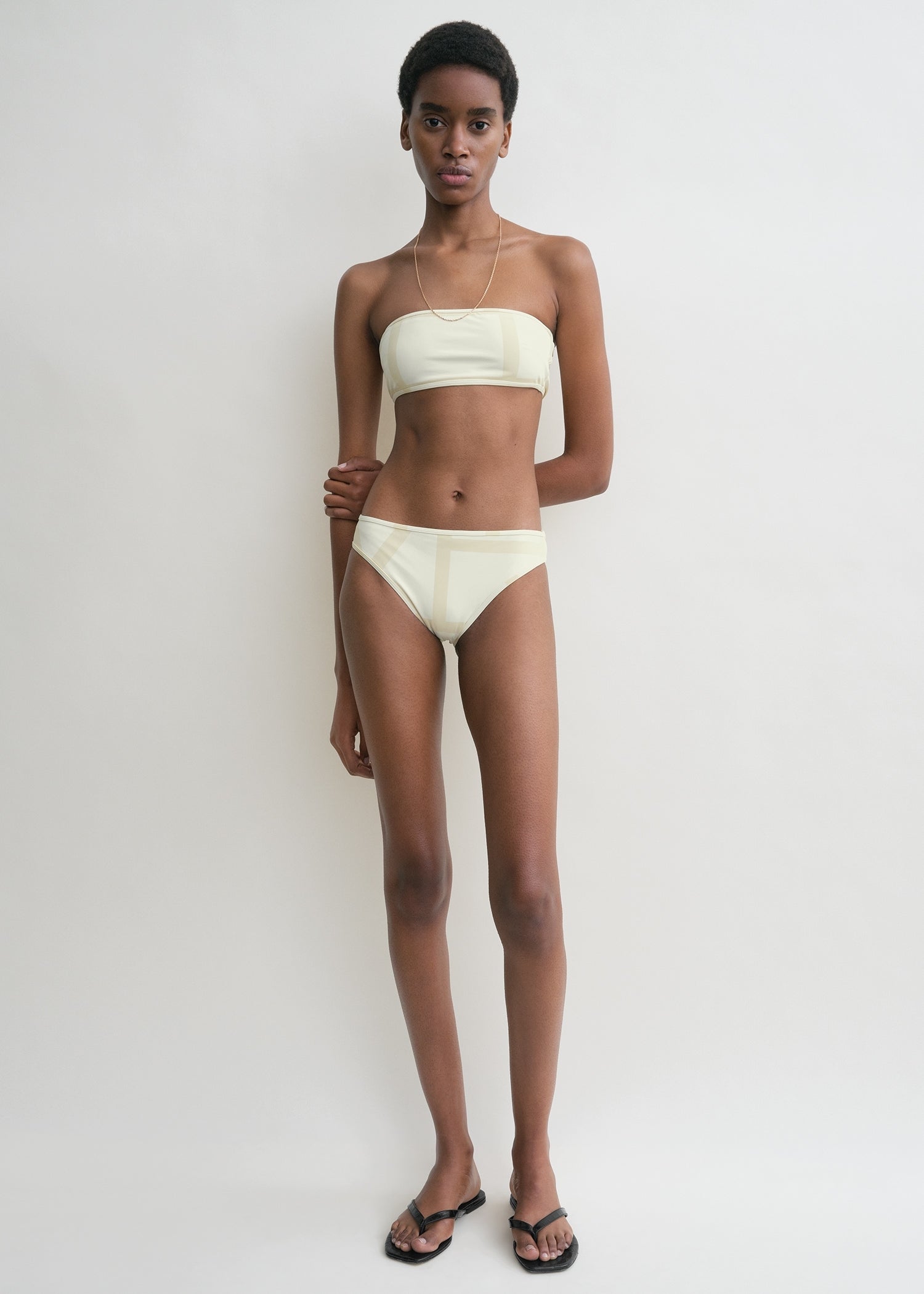 Monogram bikini bottoms ecru/straw from Toteme - $160