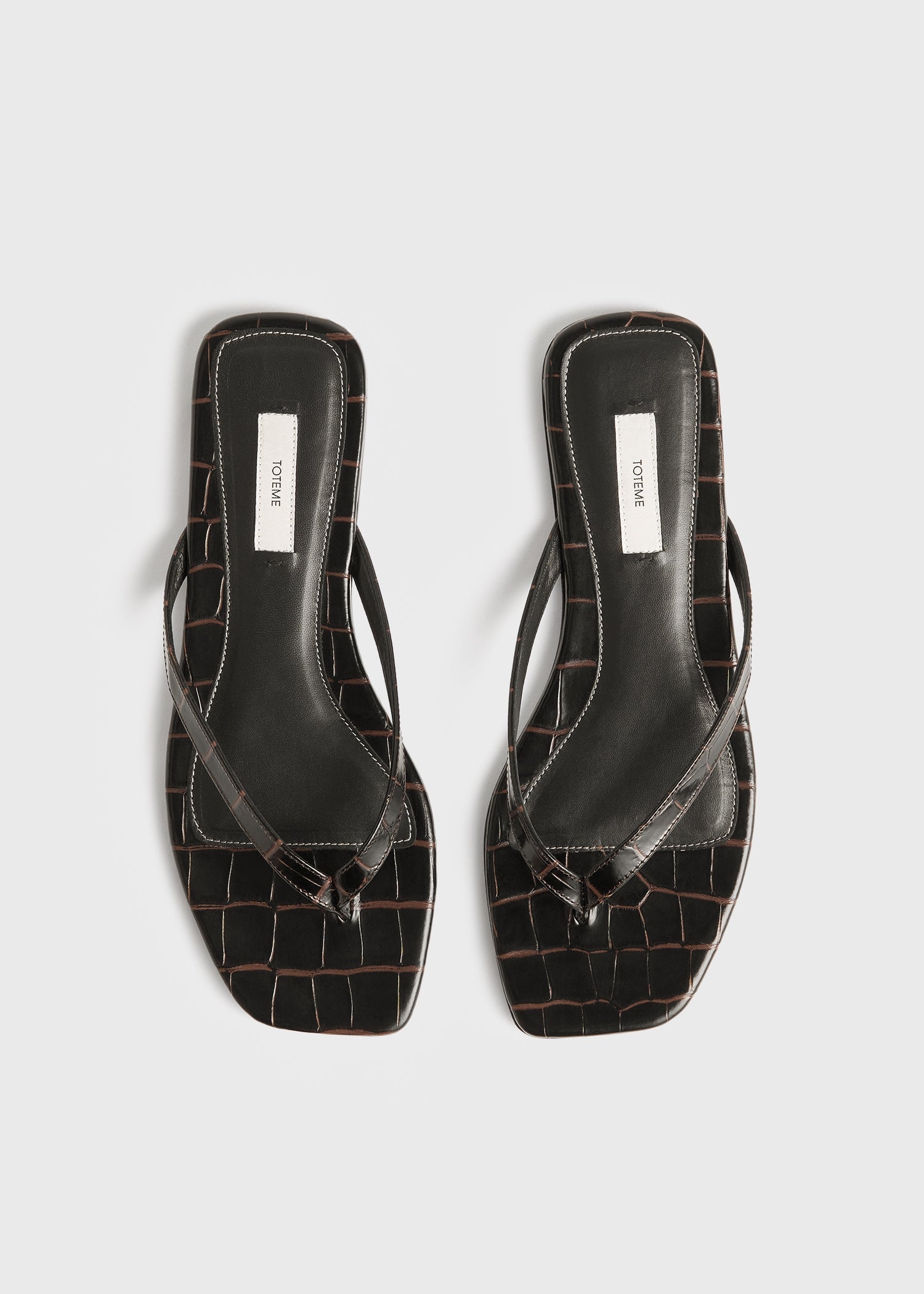 Croco-embossed flip flops dark brown