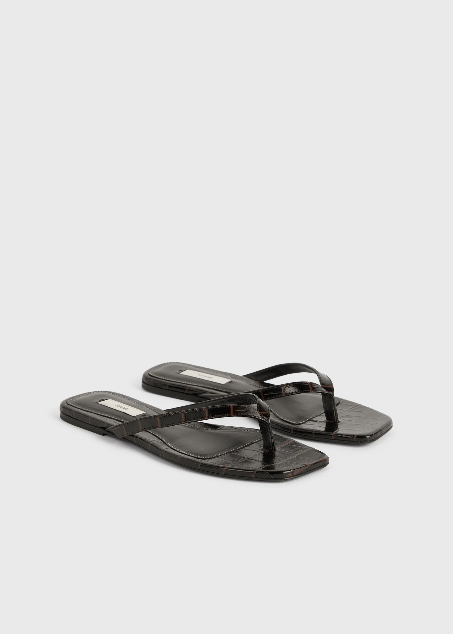 Croco-embossed flip flops dark brown