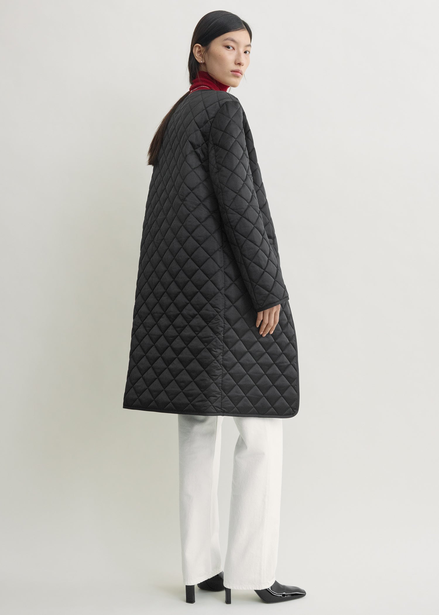 Quilted collarless coat black