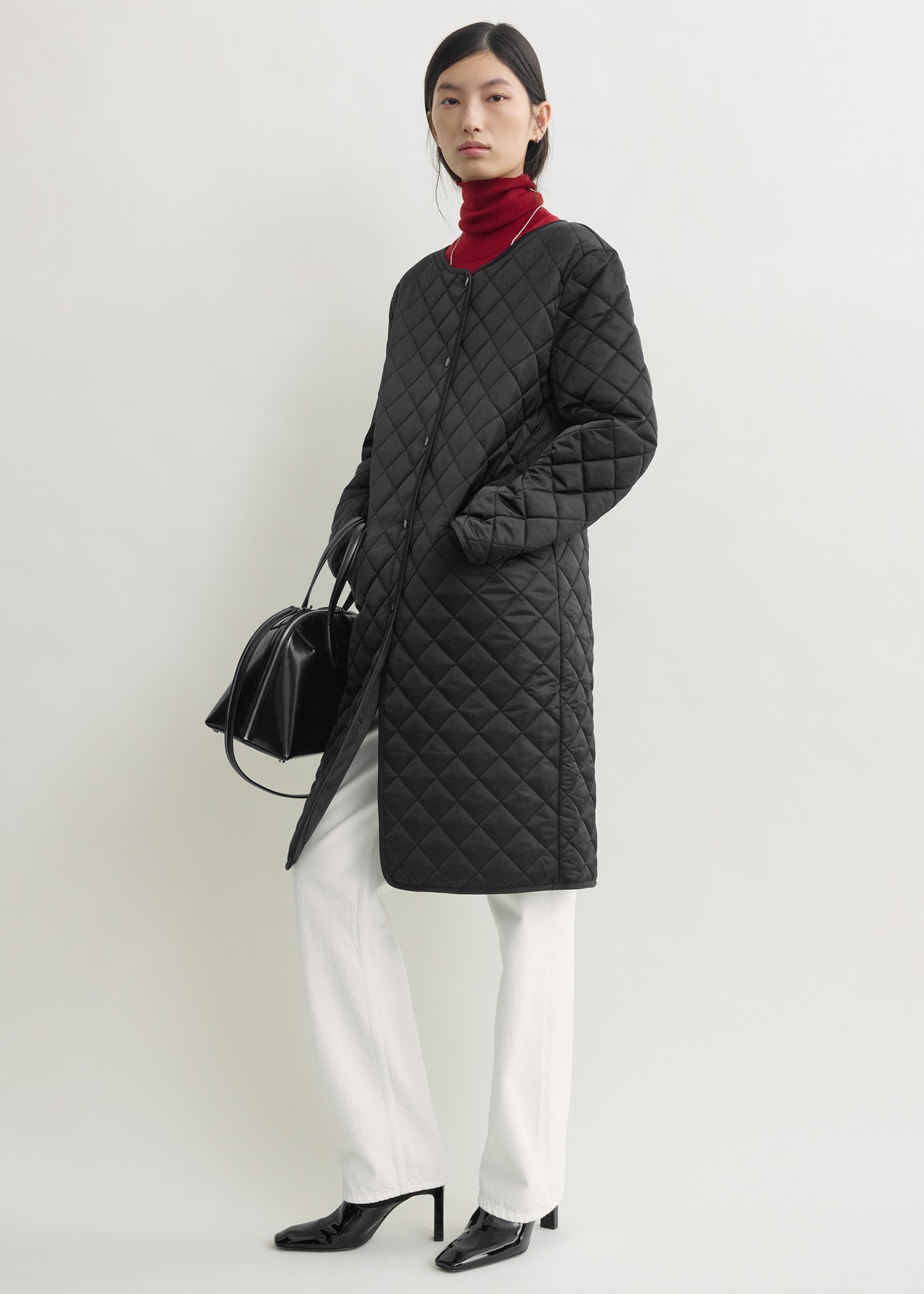 Quilted collarless coat black