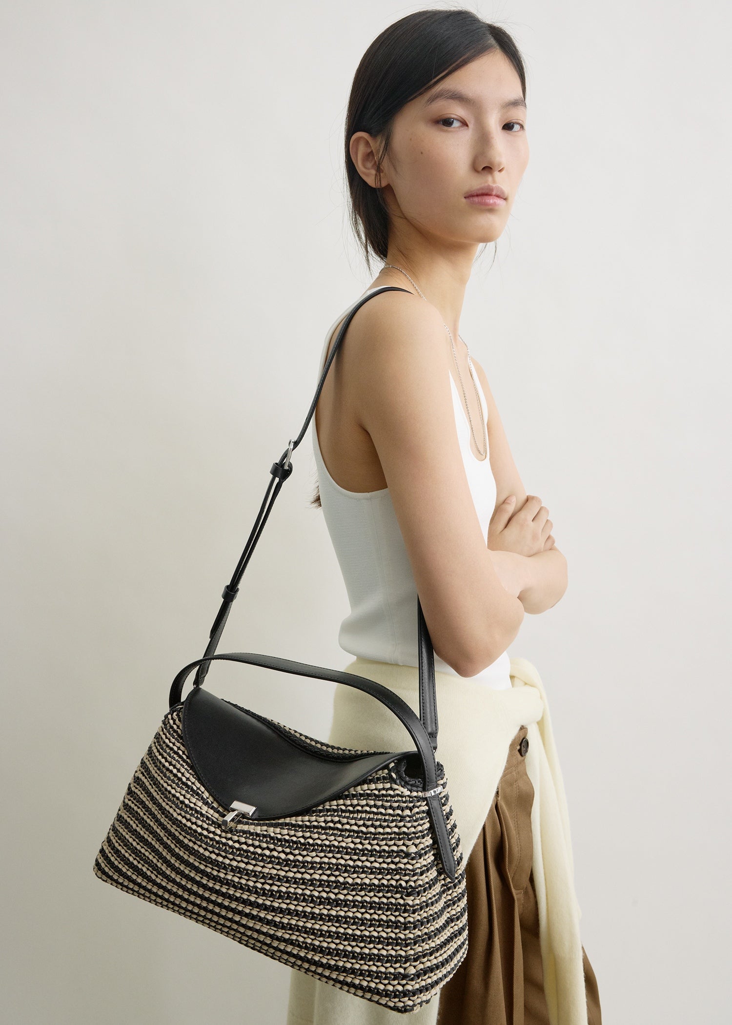 T-lock woven-leather top handle black/sand
