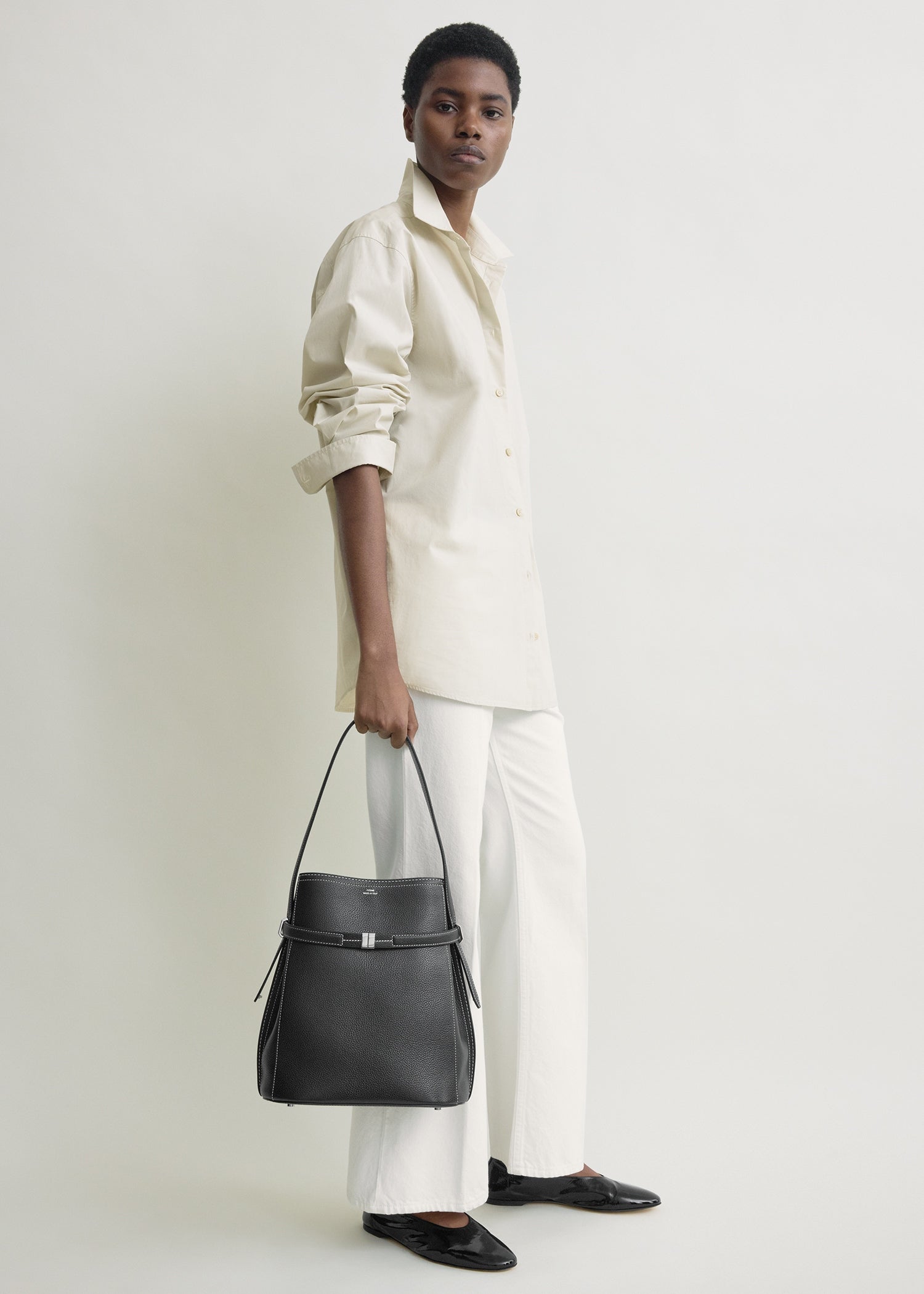 Belted grained-leather bucket bag black