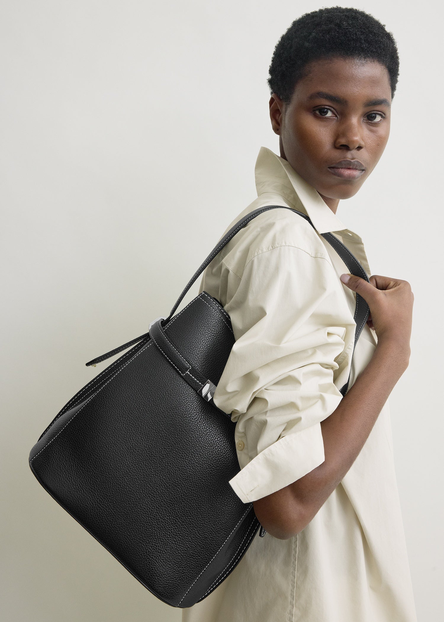 Belted grained-leather bucket bag black