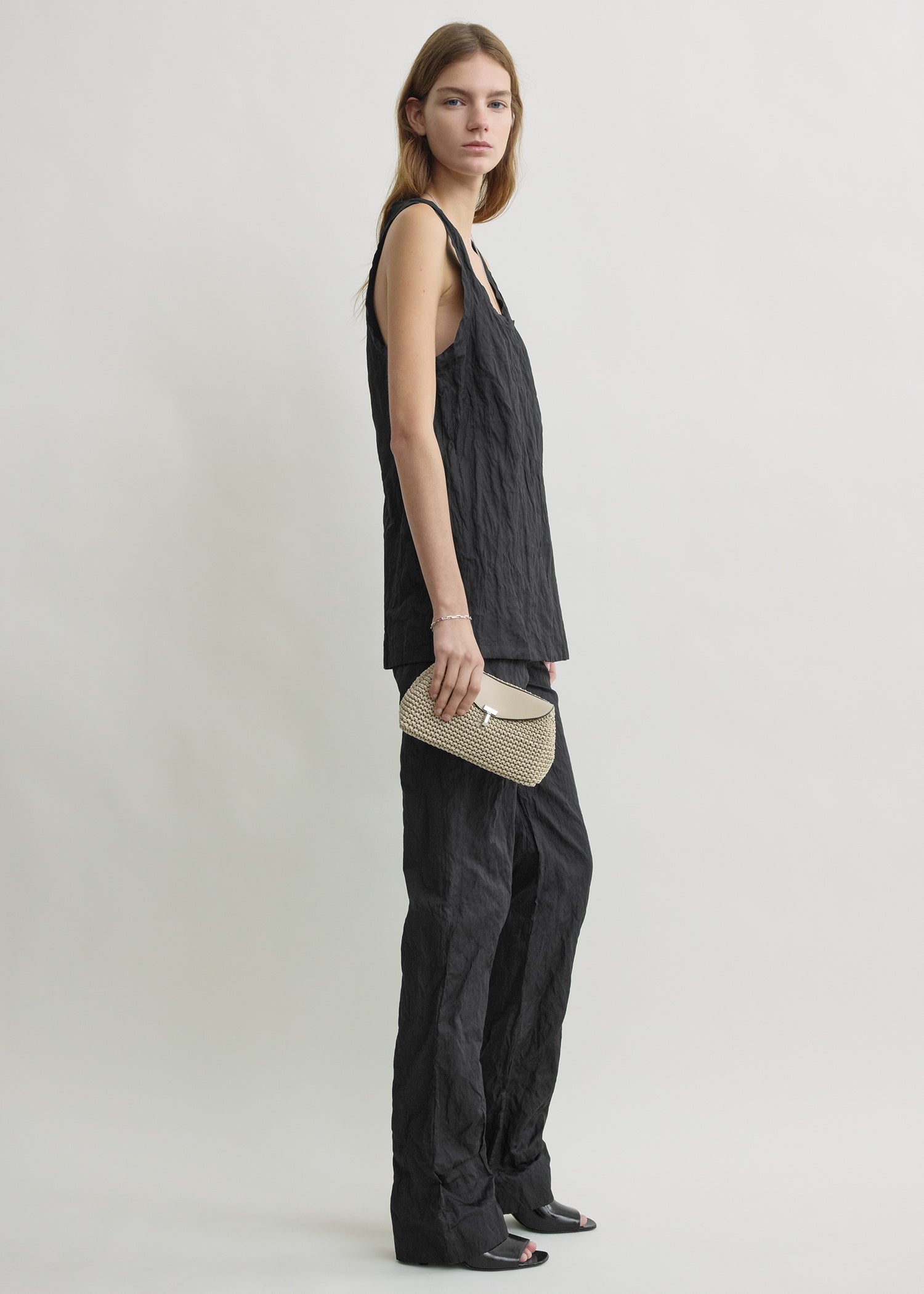 Mini T-lock woven-leather clutch fawn – TOTEME