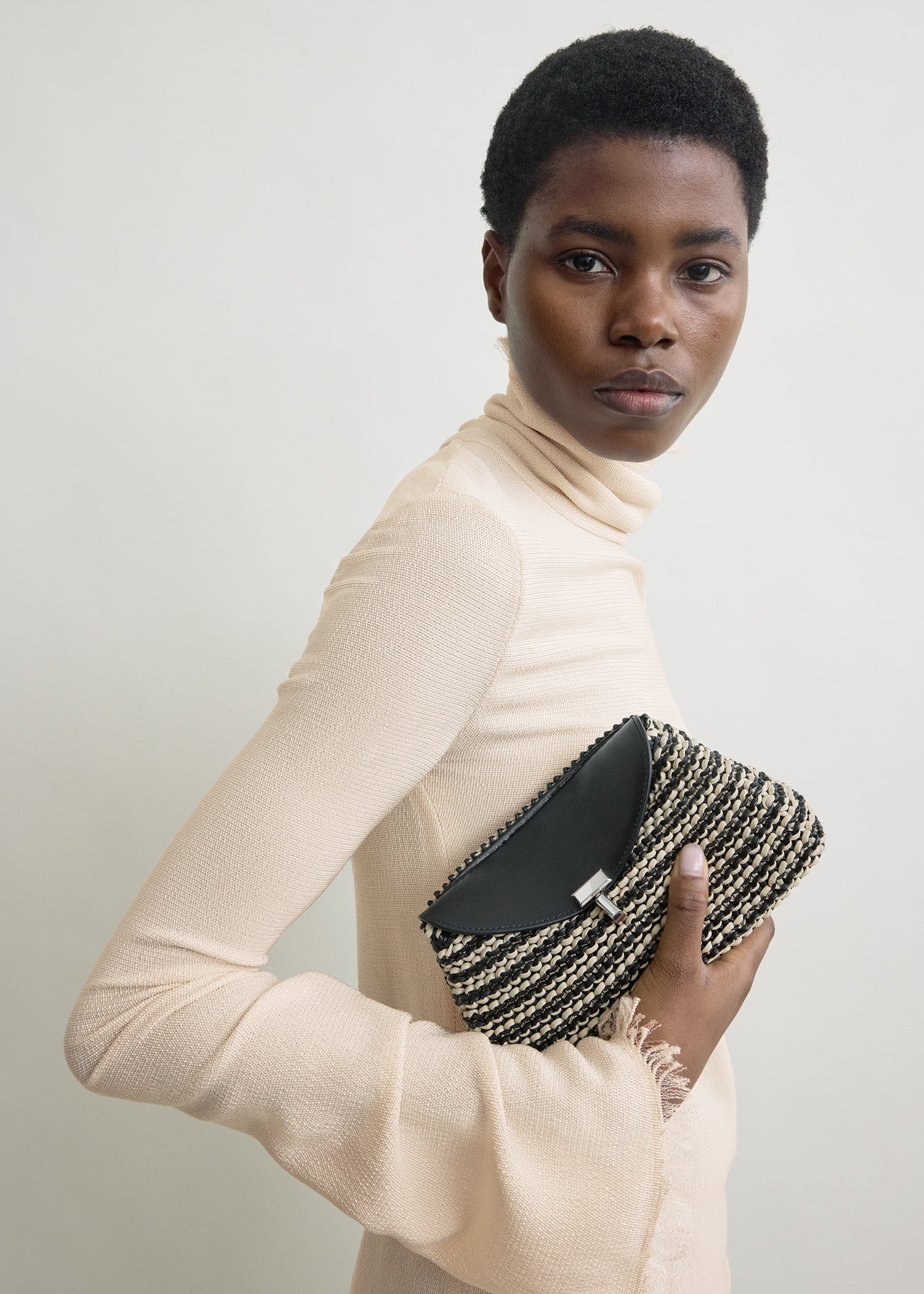 Mini T-lock woven-leather clutch black/sand
