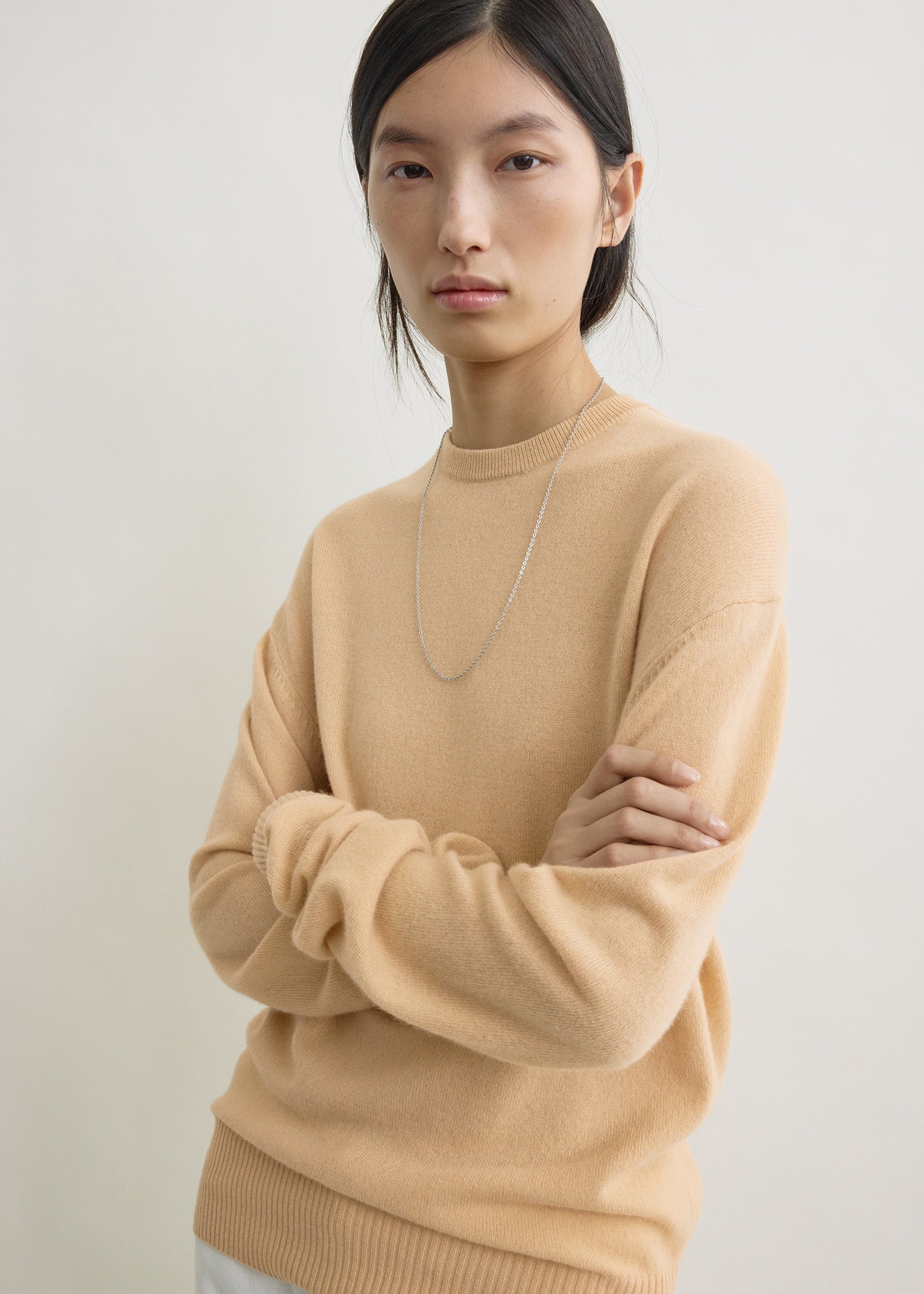 Classic cashmere crew knit pale apricot from Toteme - $750