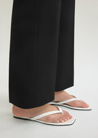 Croco-embossed flip flops off-white