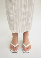Croco-embossed heeled flip flops off-white