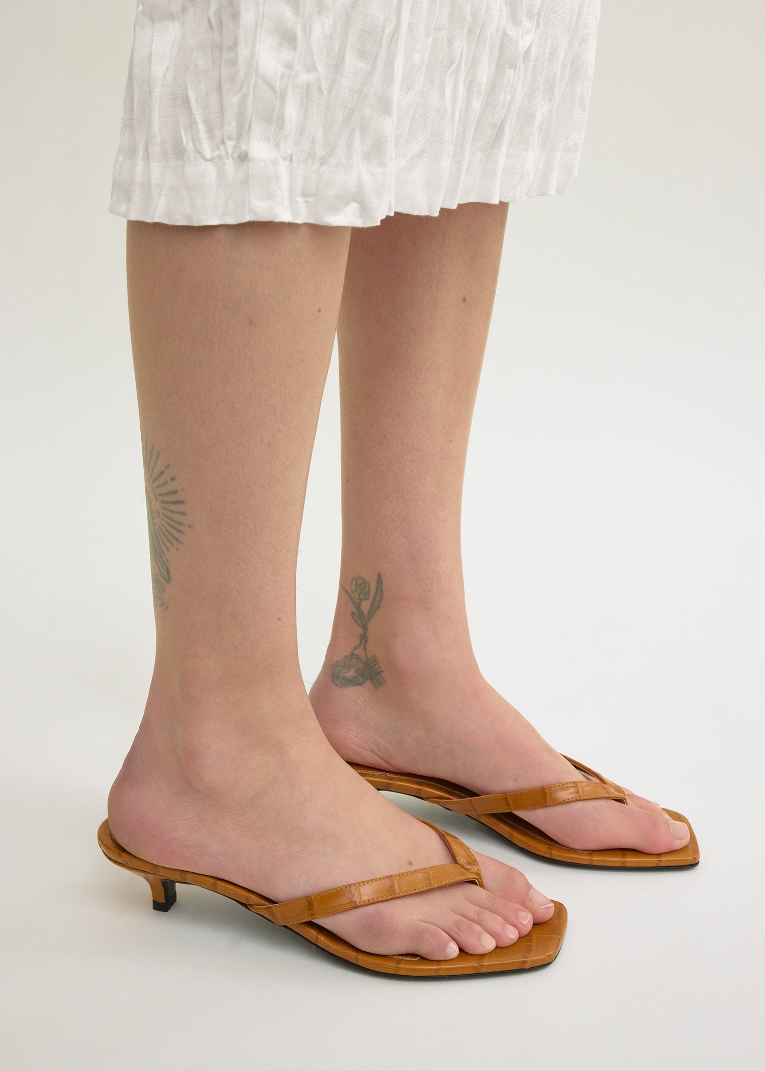 Croco-embossed heeled flip flops tangerine – TOTEME