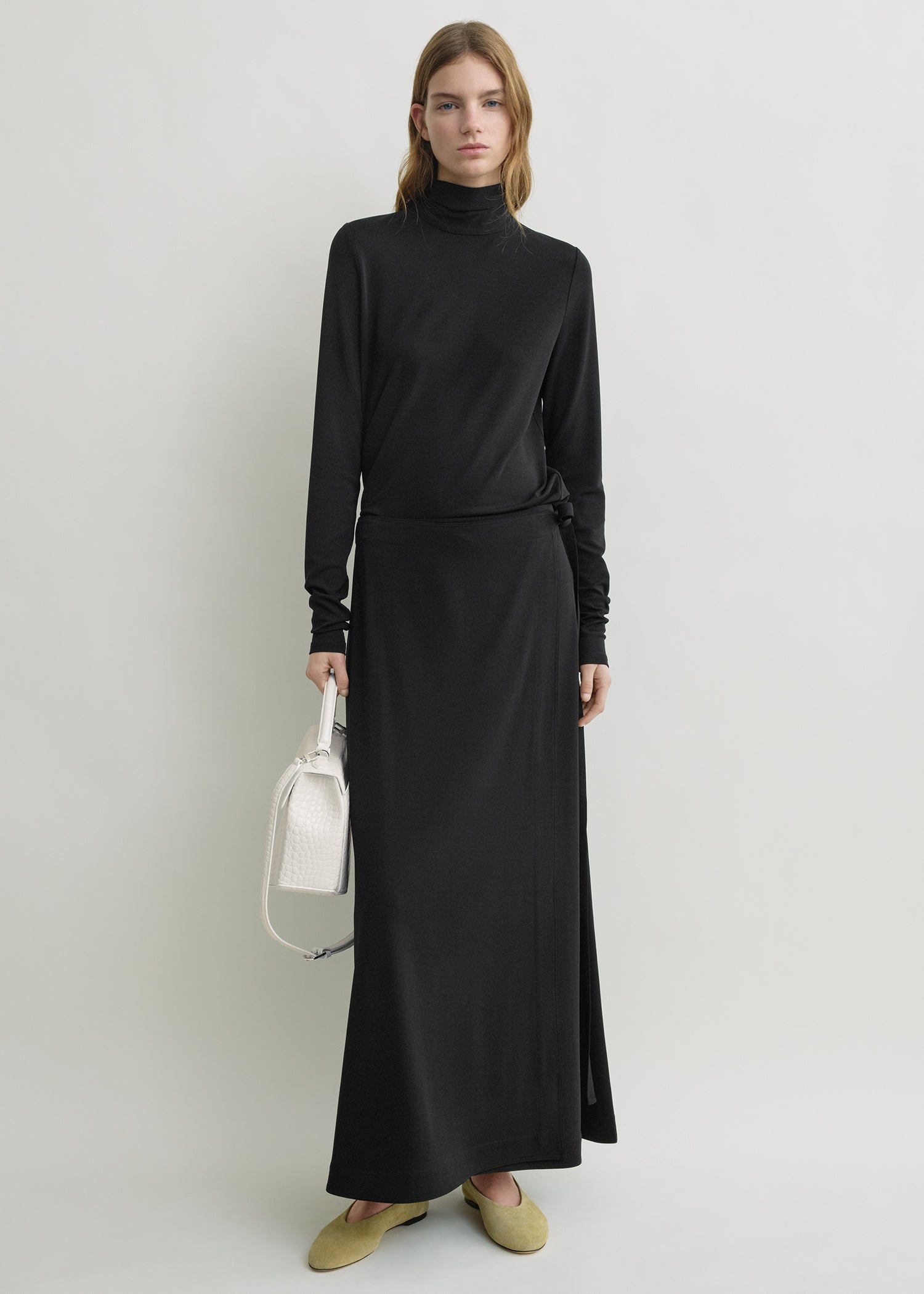 Fluid jersey skirt black from Toteme - $720