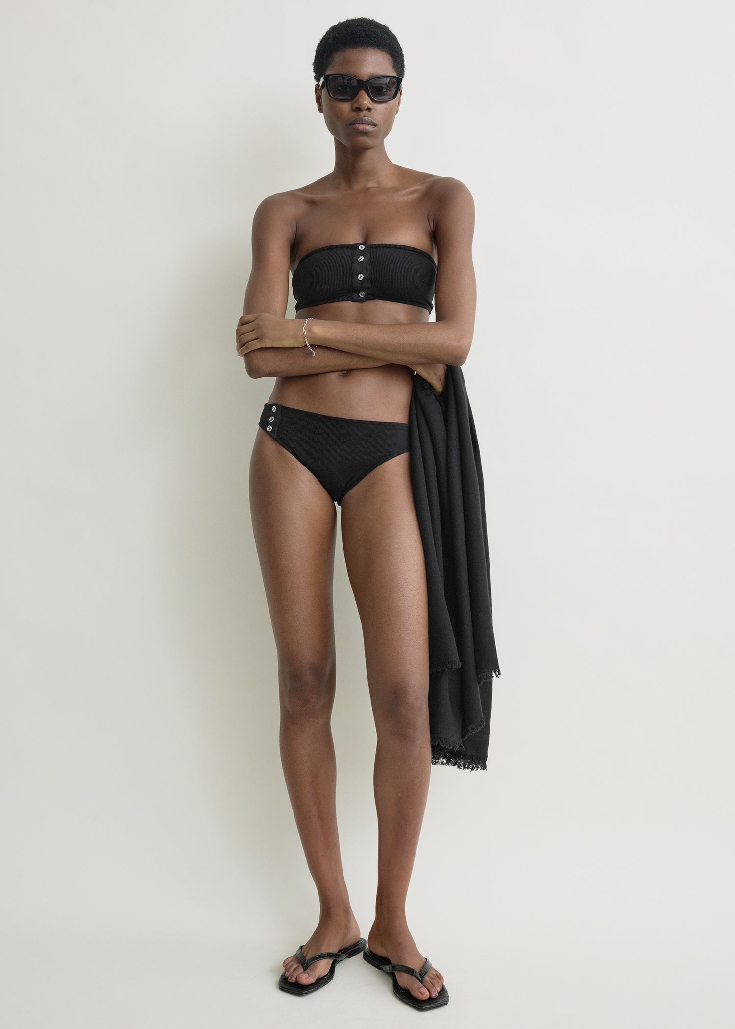 Ribbed strapless bikini top black from Toteme - $220