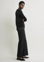 Kick flare raw-edge trousers black